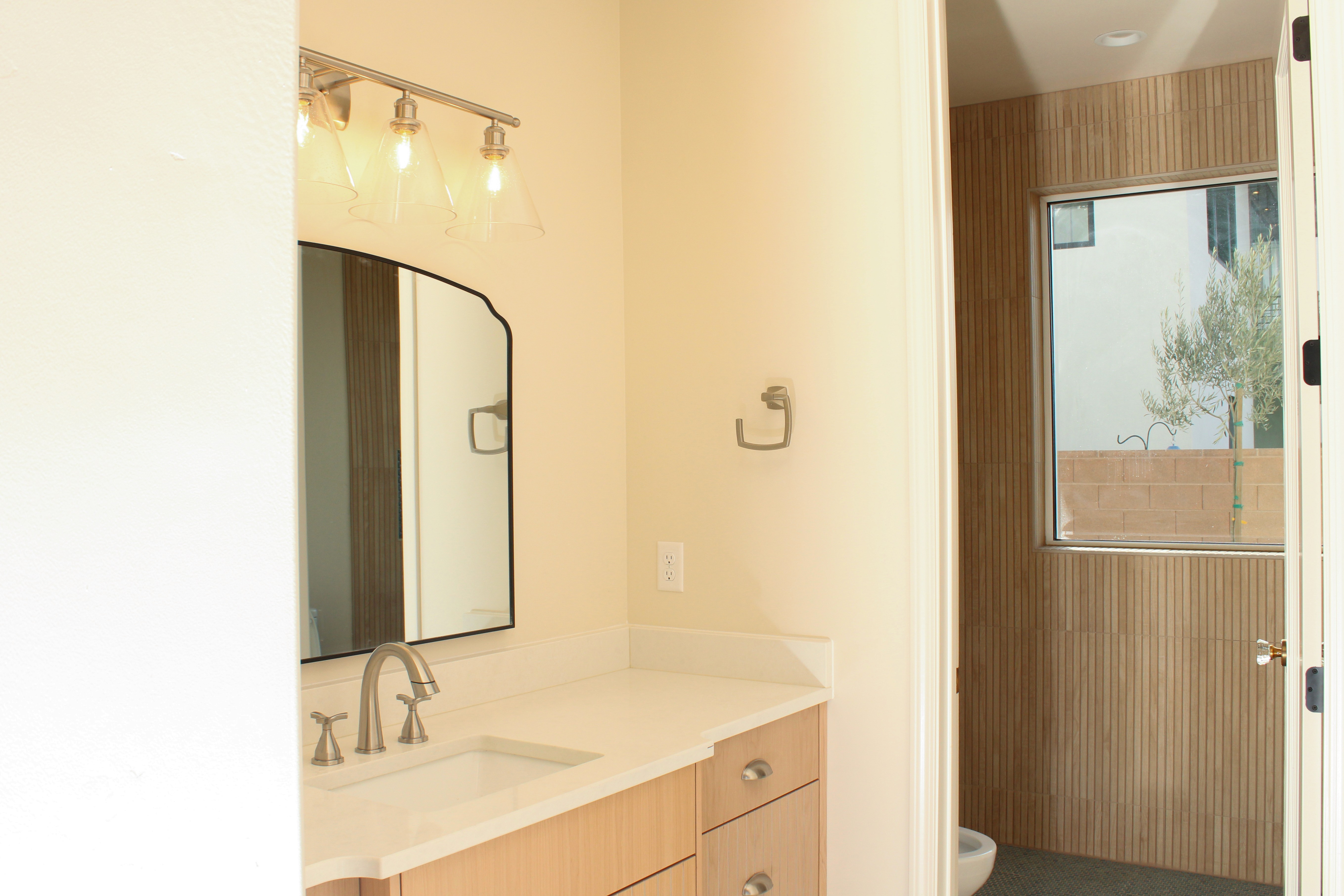 Bathroom vanity overlooking a walk-in shower in a custom home in St. George, Utah.