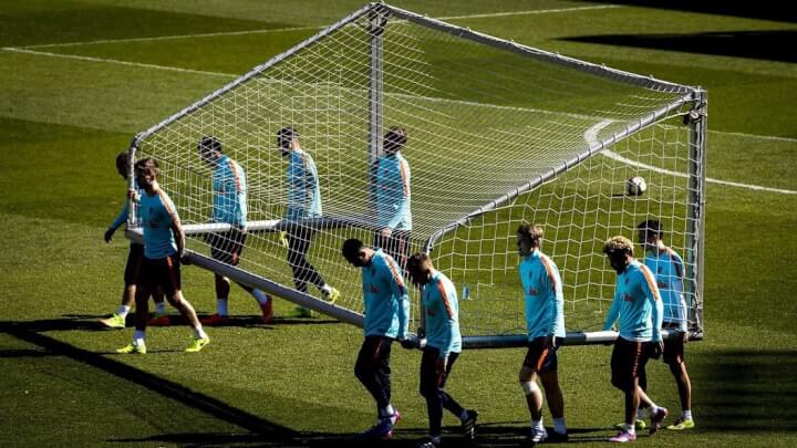 team moving a goal post