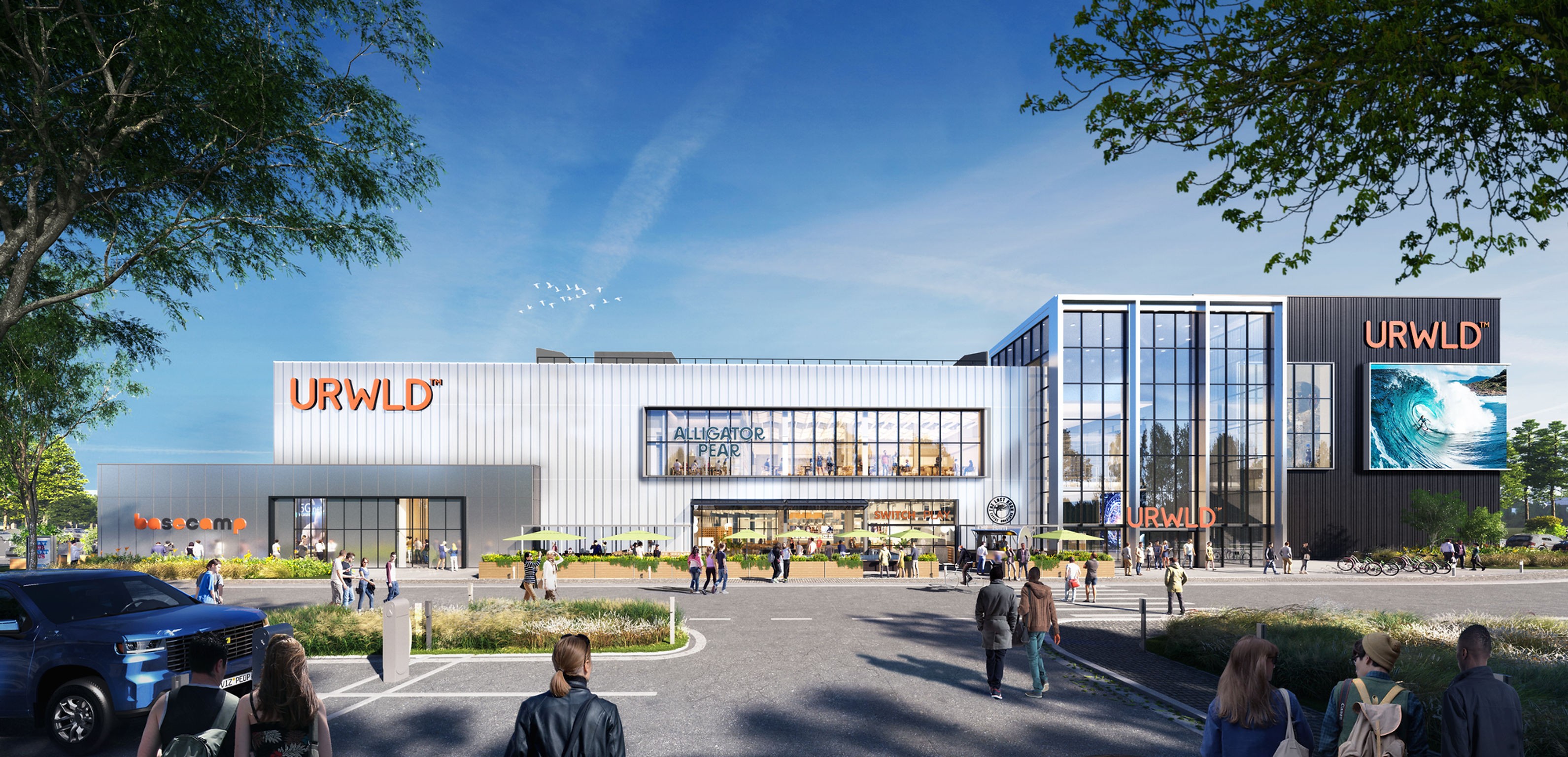 Person wearing orange sunglasses with dramatic orange and red lighting effects creating an artistic portrait