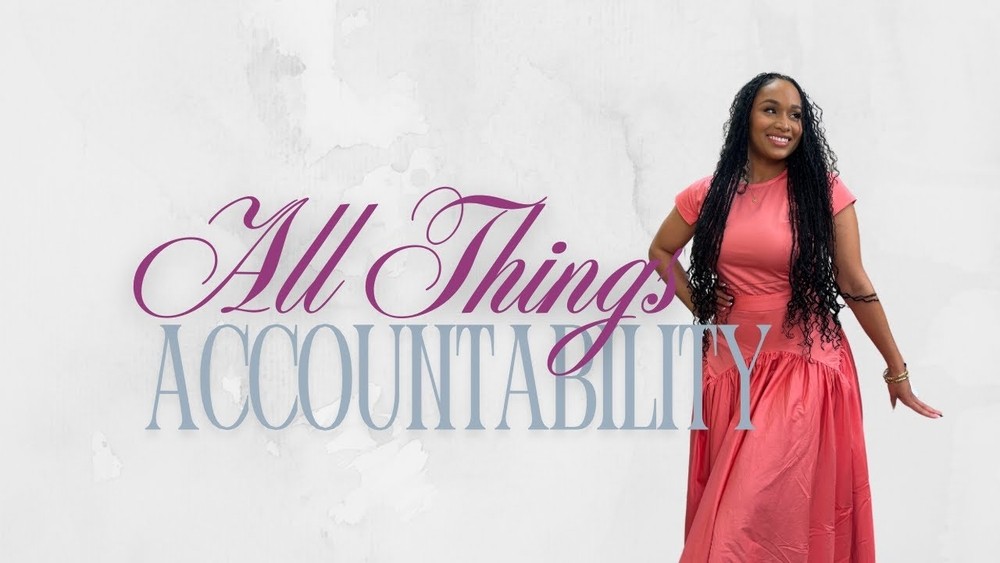 Studio C – All Things ACCOUNTABILITY “A woman in a long red dress standing and smiling, promoting an episode titled ‘All Things ACCOUNTABILITY’—filmed in Studio C.”