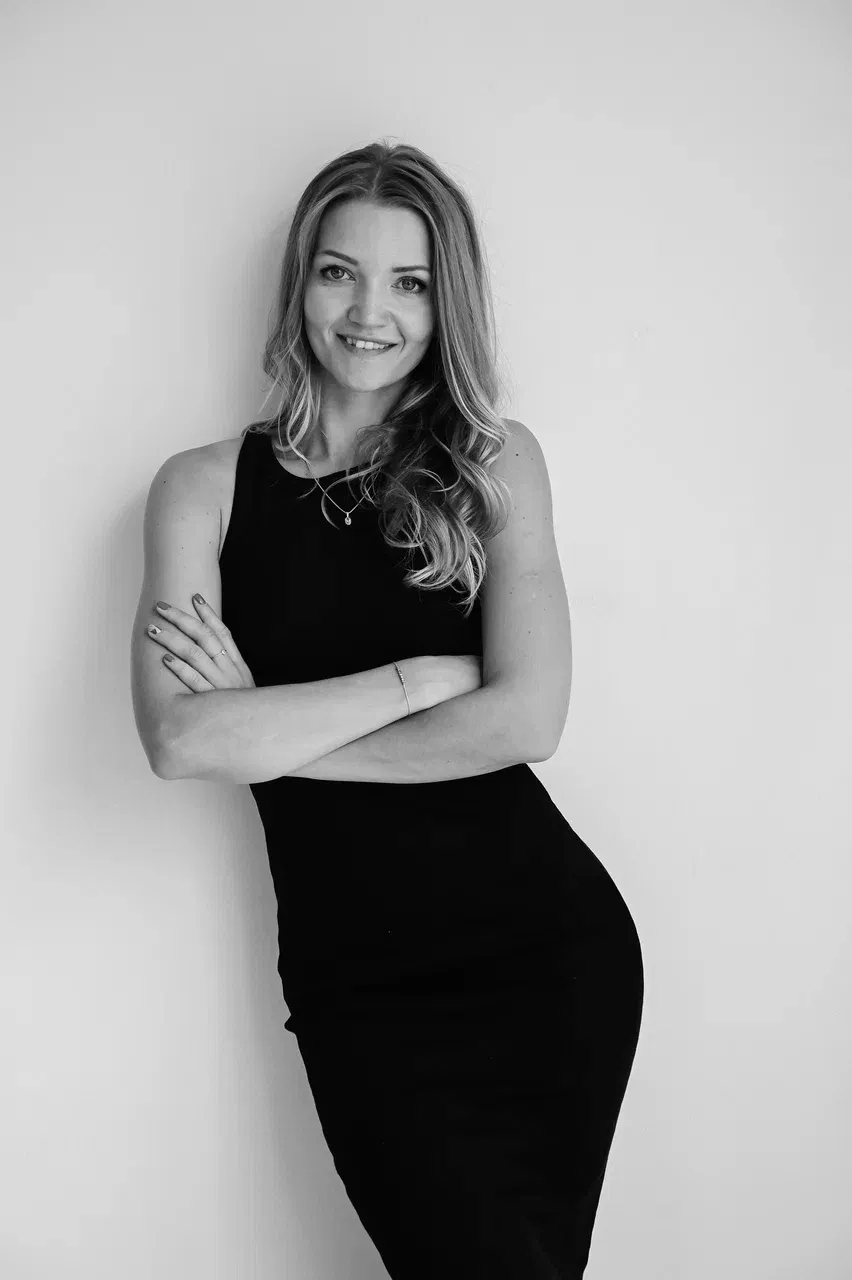 grayscale photo of woman in white button up shirt