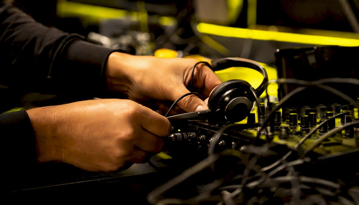 Call center headset connected with neon yellow lighting