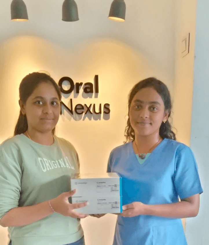 Smiling person with wet skin and short hair