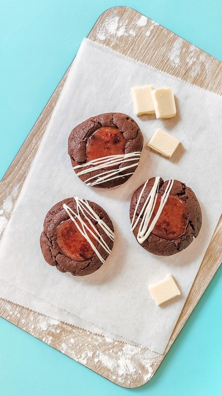 Chocolate cookie with cherry jam center