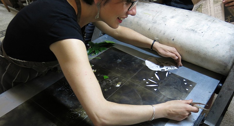 woman making cutting out image