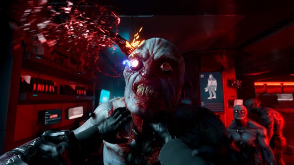 Screenshot Killing Floor 3 PC – affrontement sanglant contre des créatures mutantes dans un couloir futuriste sur KeyVerse Gaming