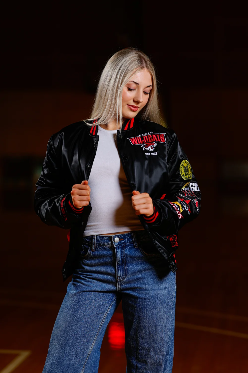 Perth Wildcats supporter wearing merchandise from the redesigned identity