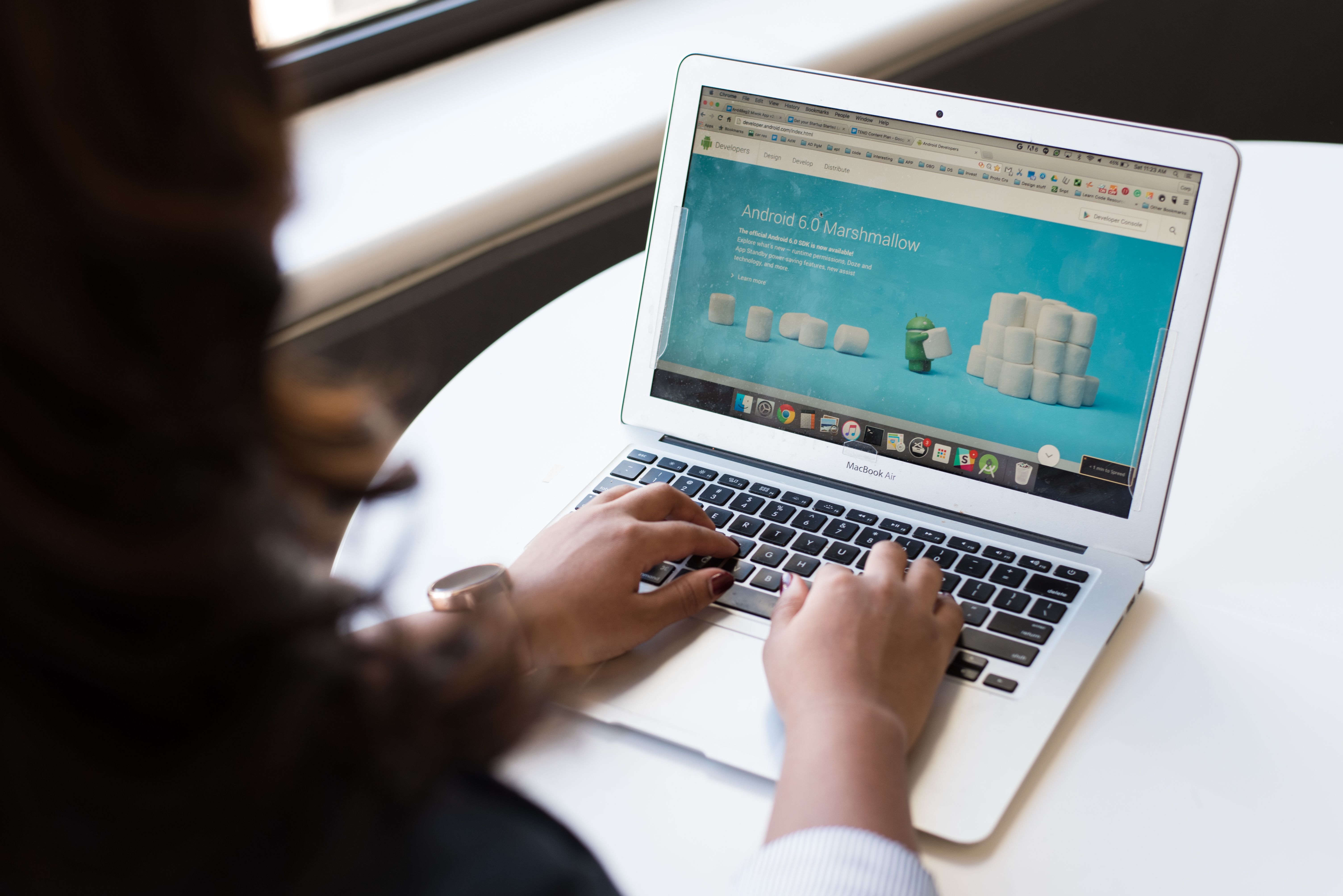 Woman working on a website on her laptop