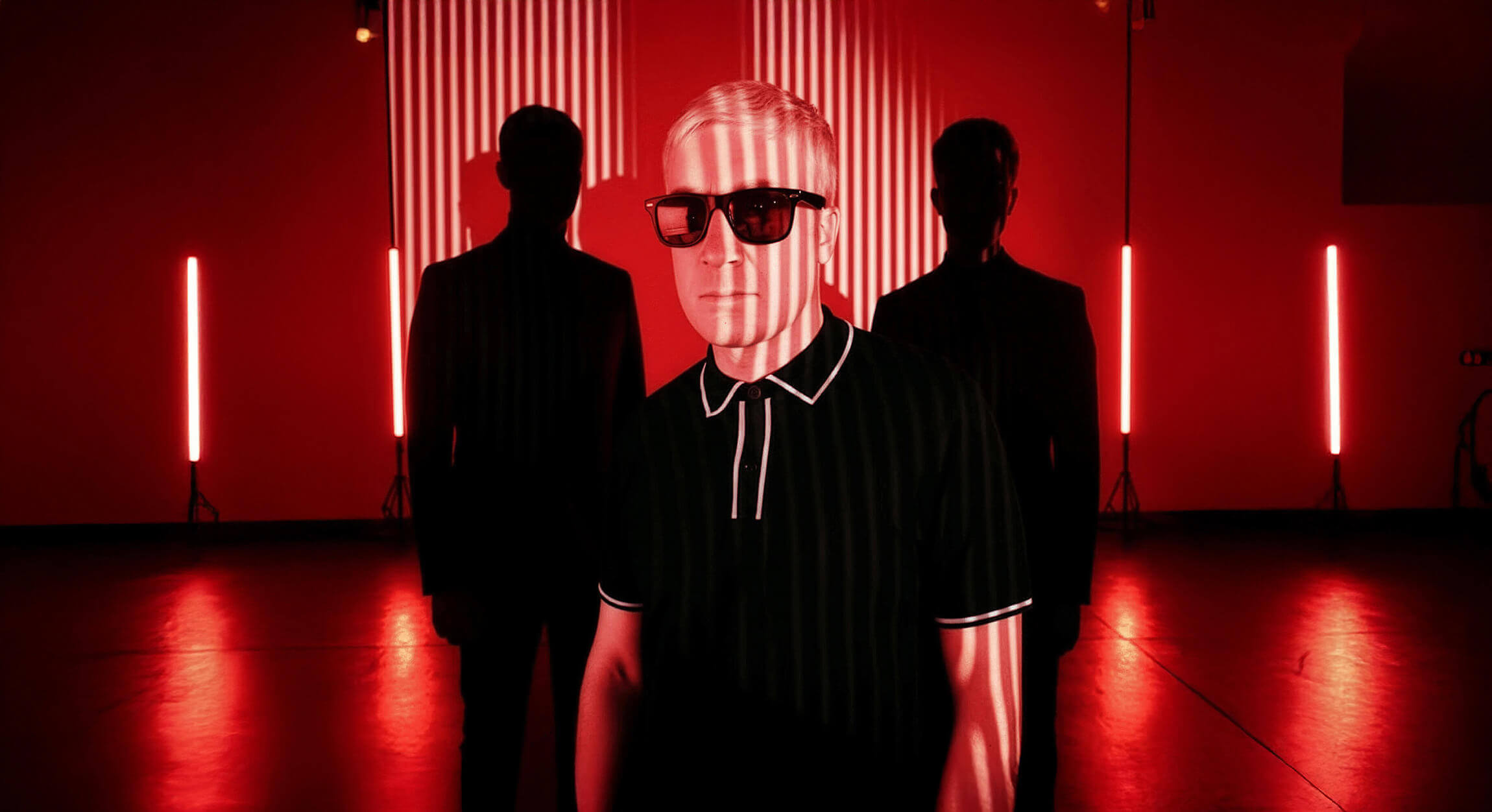 a man holding a cocktail