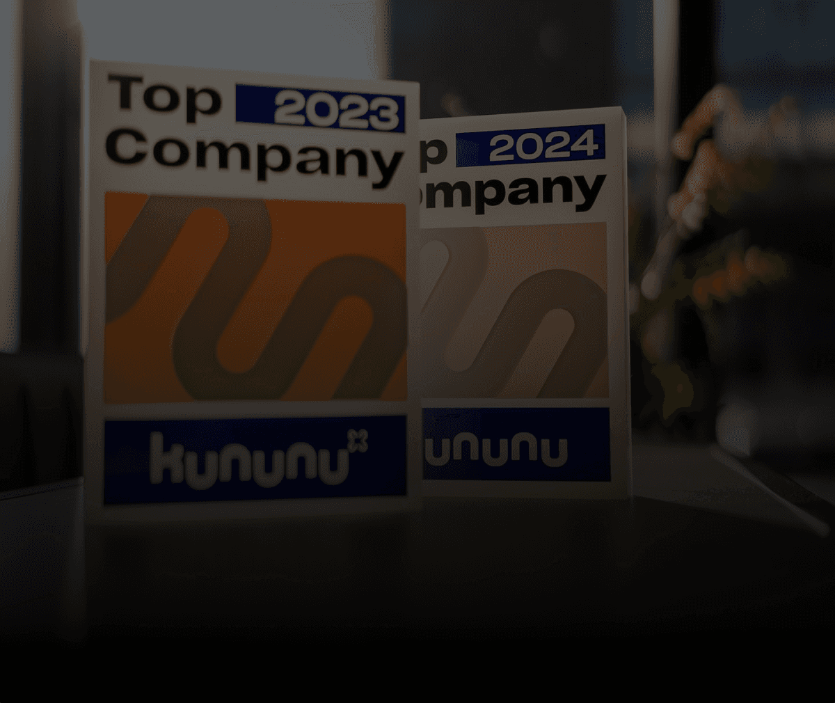 Zwei Kununu Top Company Auszeichnungen von der Sonne angestrahlt