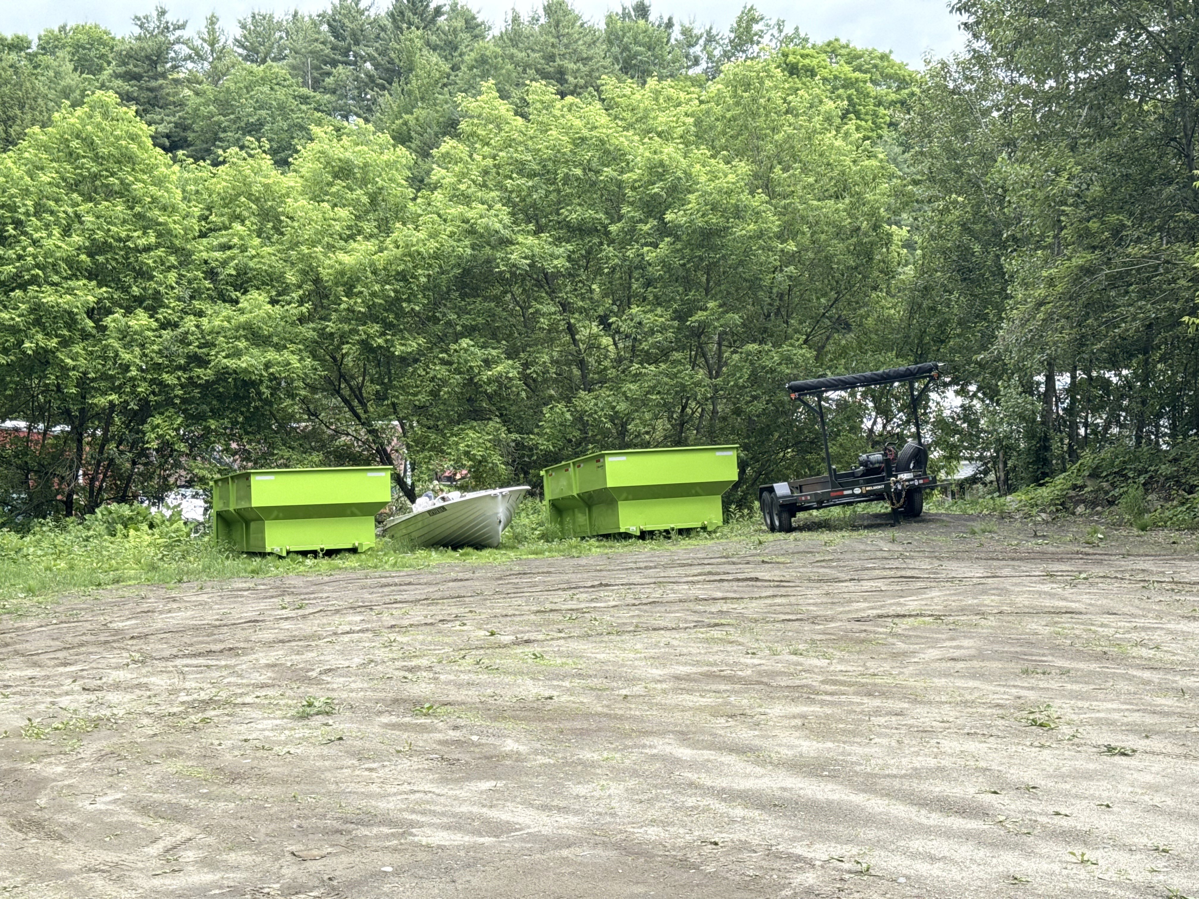 Worker standing near garbage