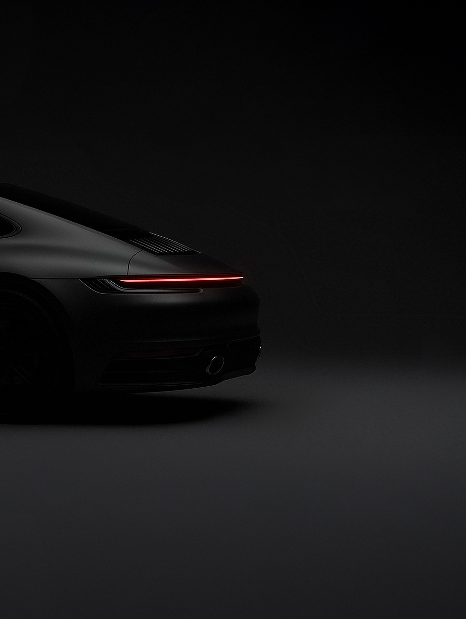 Luxury car rear in darkness