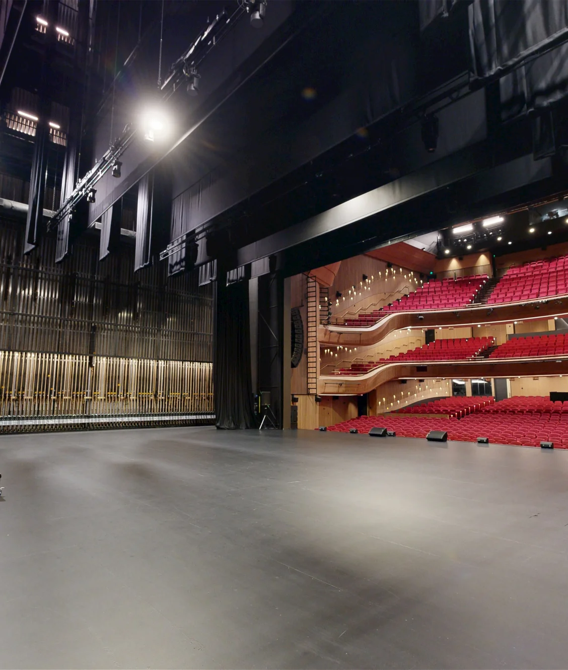 A premium 3D digital twin perspective from the stage of Her Majesty's Theatre, engineered by ABM visual to streamline remote production planning and commercial venue management.