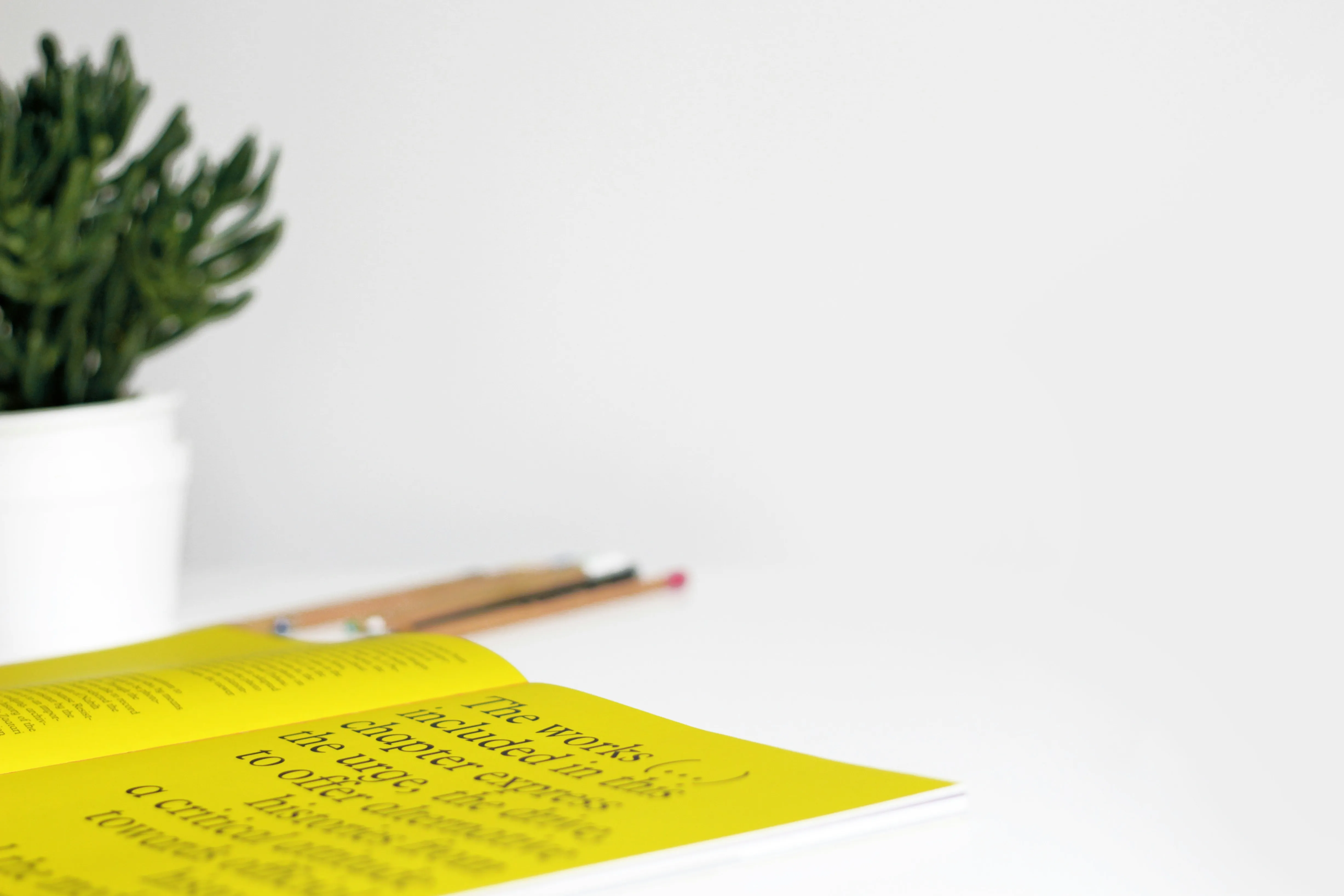 yellow printer paper on table