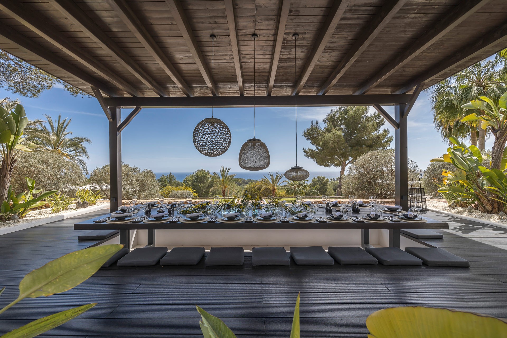 Dining deck with sea view at an exclusive luxury villa Ibiza—private VIP estate property wedding events holiday retreat