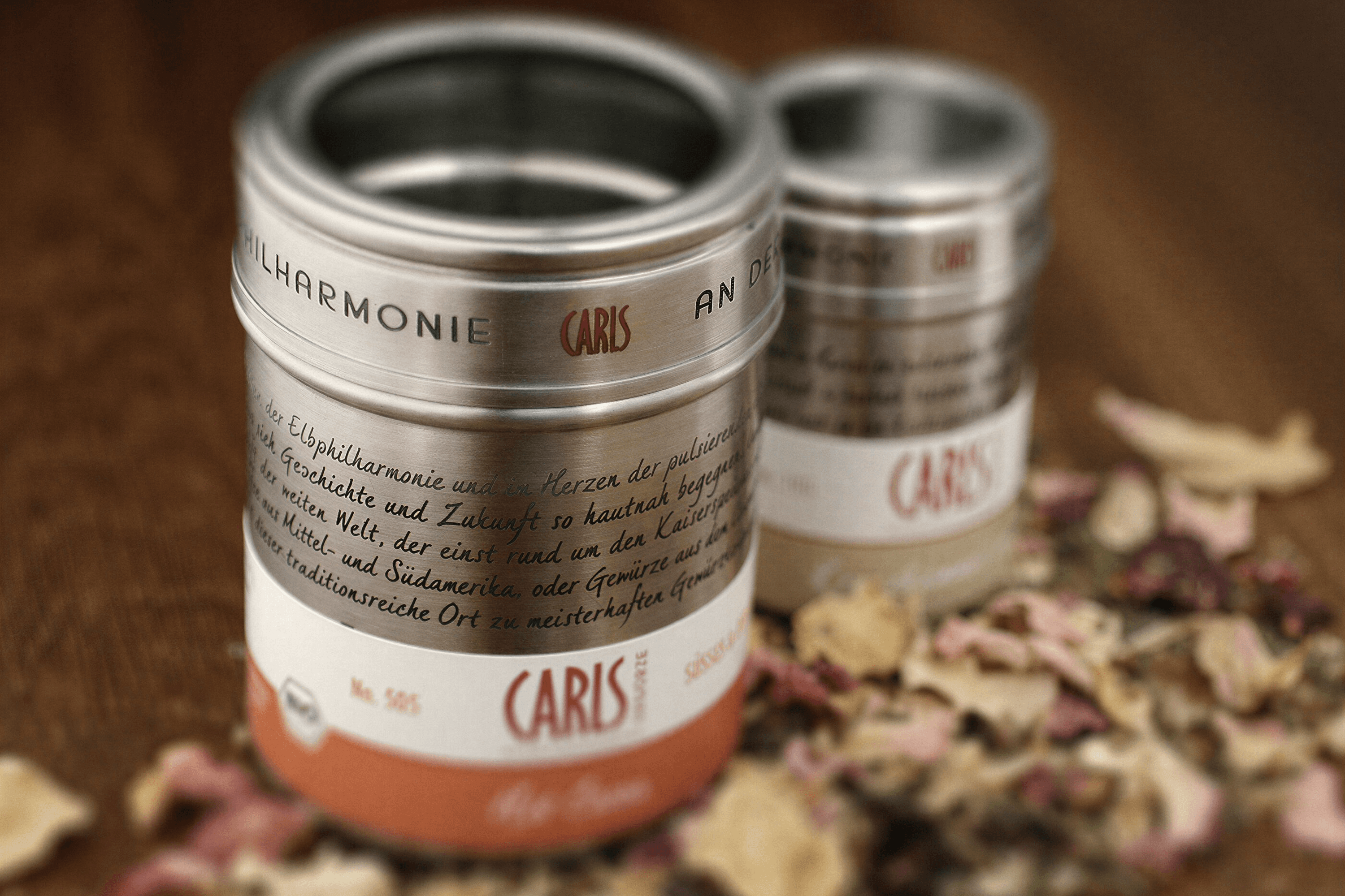 CARIS spice tins with text