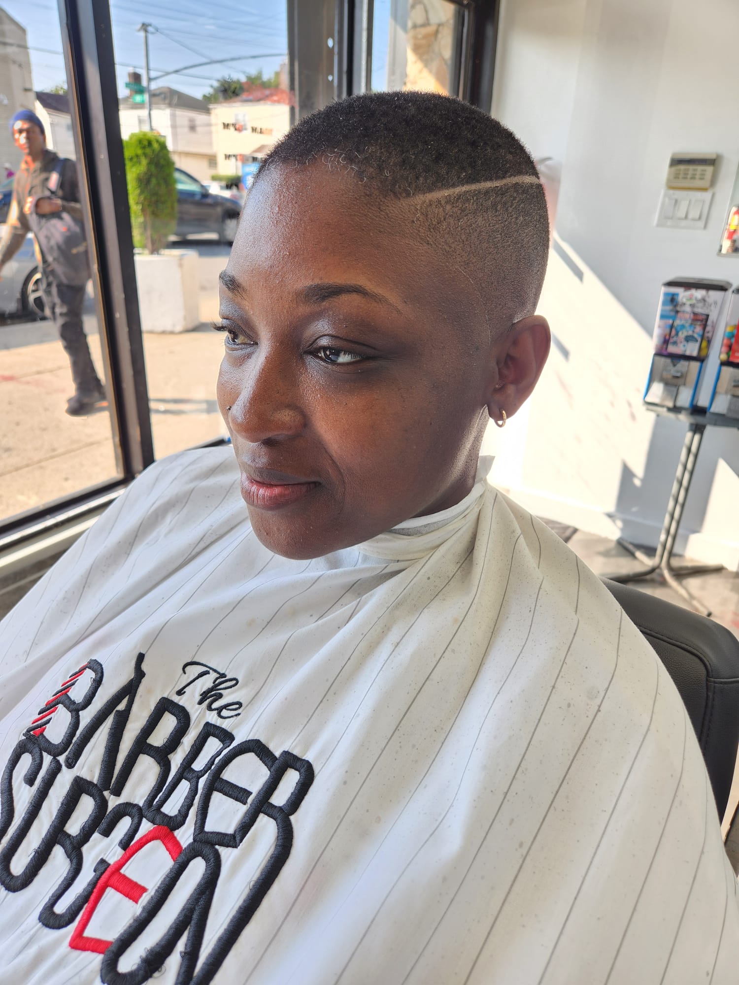 Barber attending client