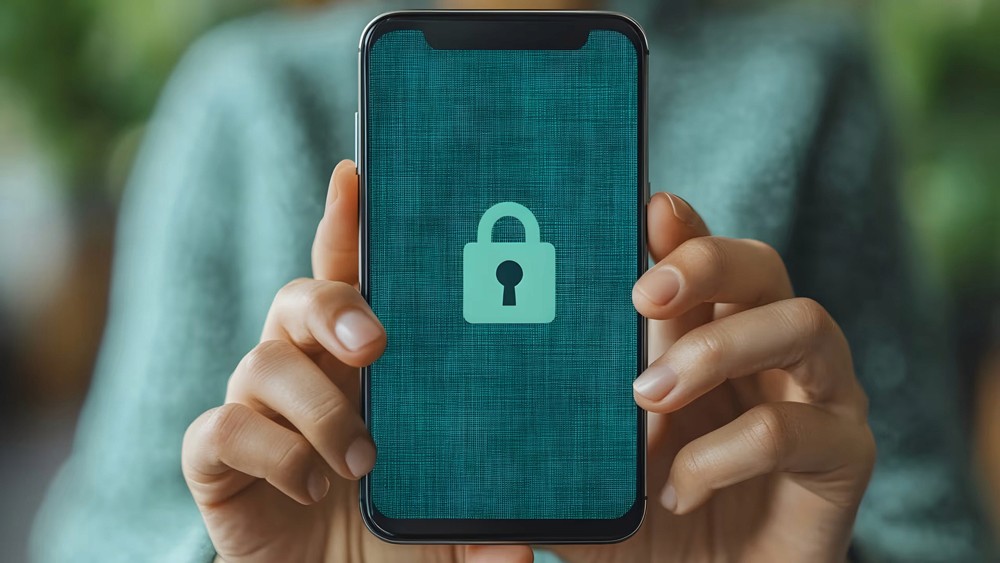 Red digital warning symbol glowing on a circuit board interface, representing active ransomware exploitation of the VMware ESXi CVE 2025 22225 vulnerability and hypervisor compromise.