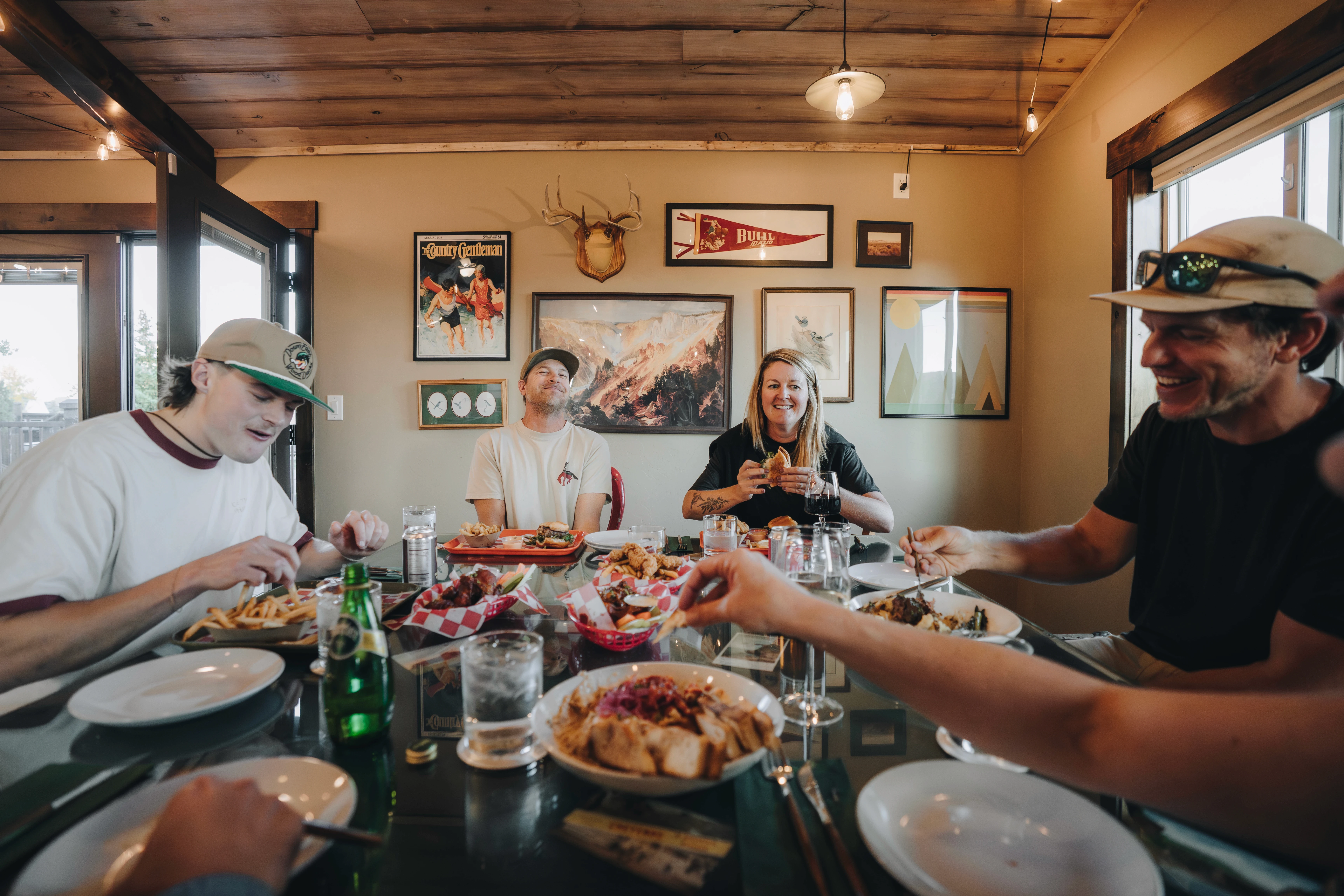 a pair of red and white striped paper bags on a picnic table