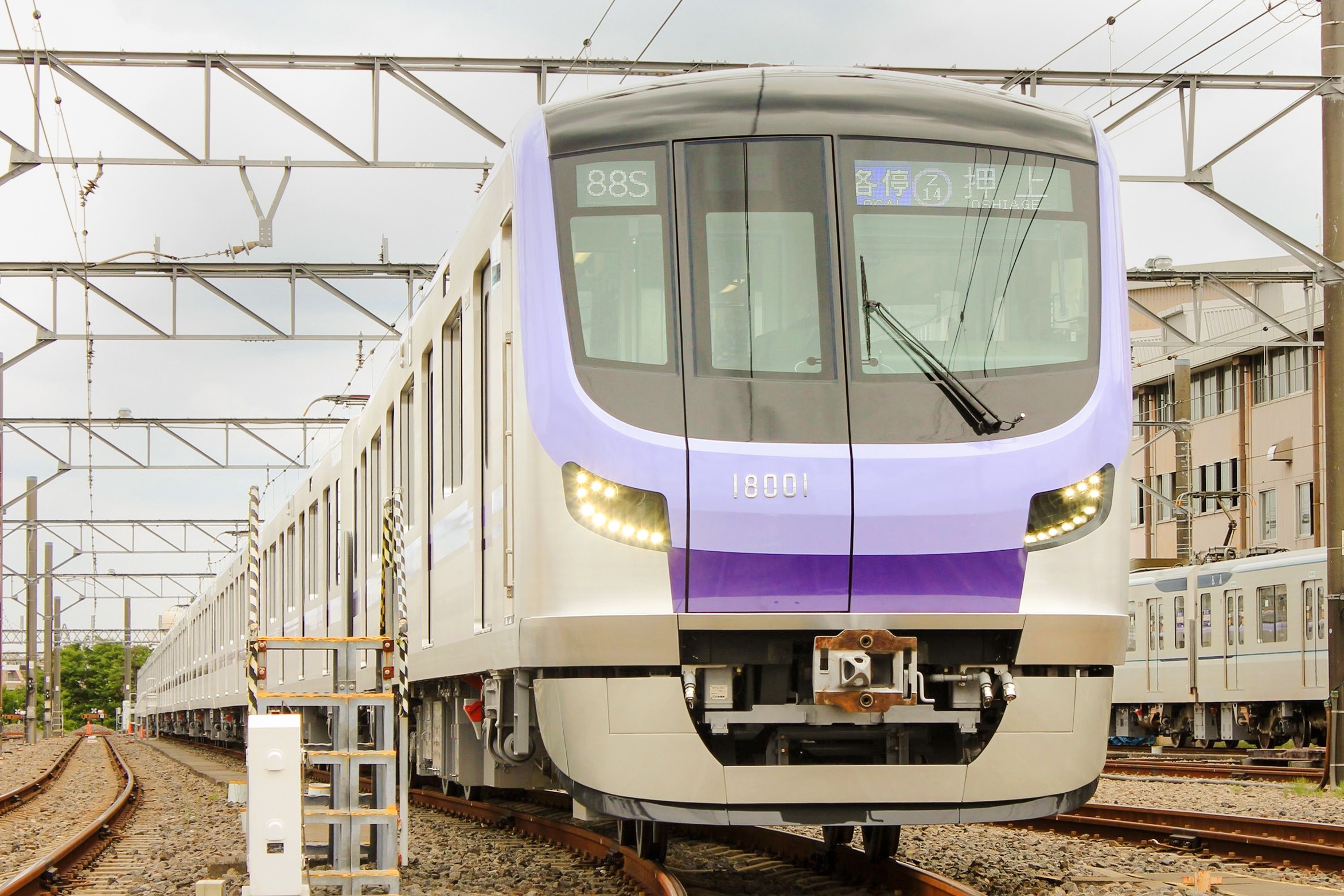 Tokyo Metro and Toei Subway trains at a station, offering 24-hour unlimited rides in Tokyo, Japan.