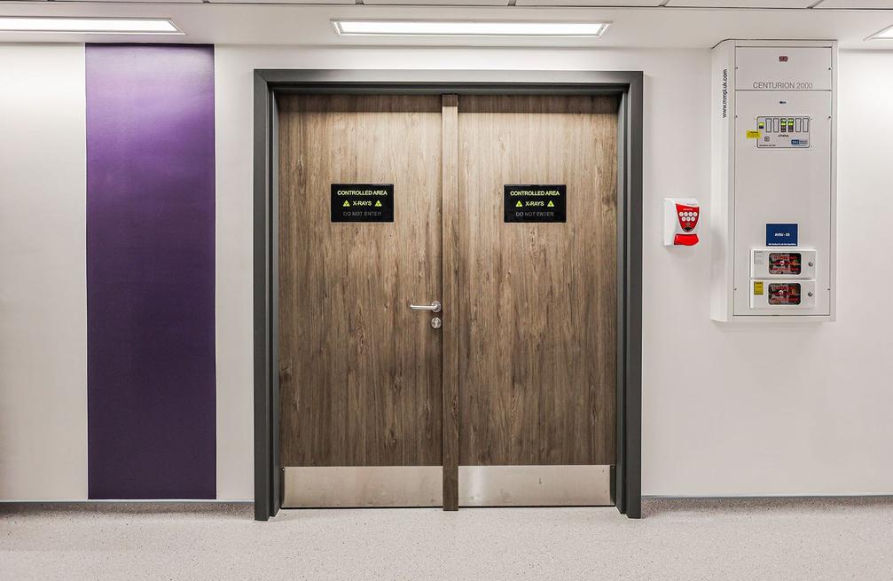 A woodgrain finish fire rated doorset