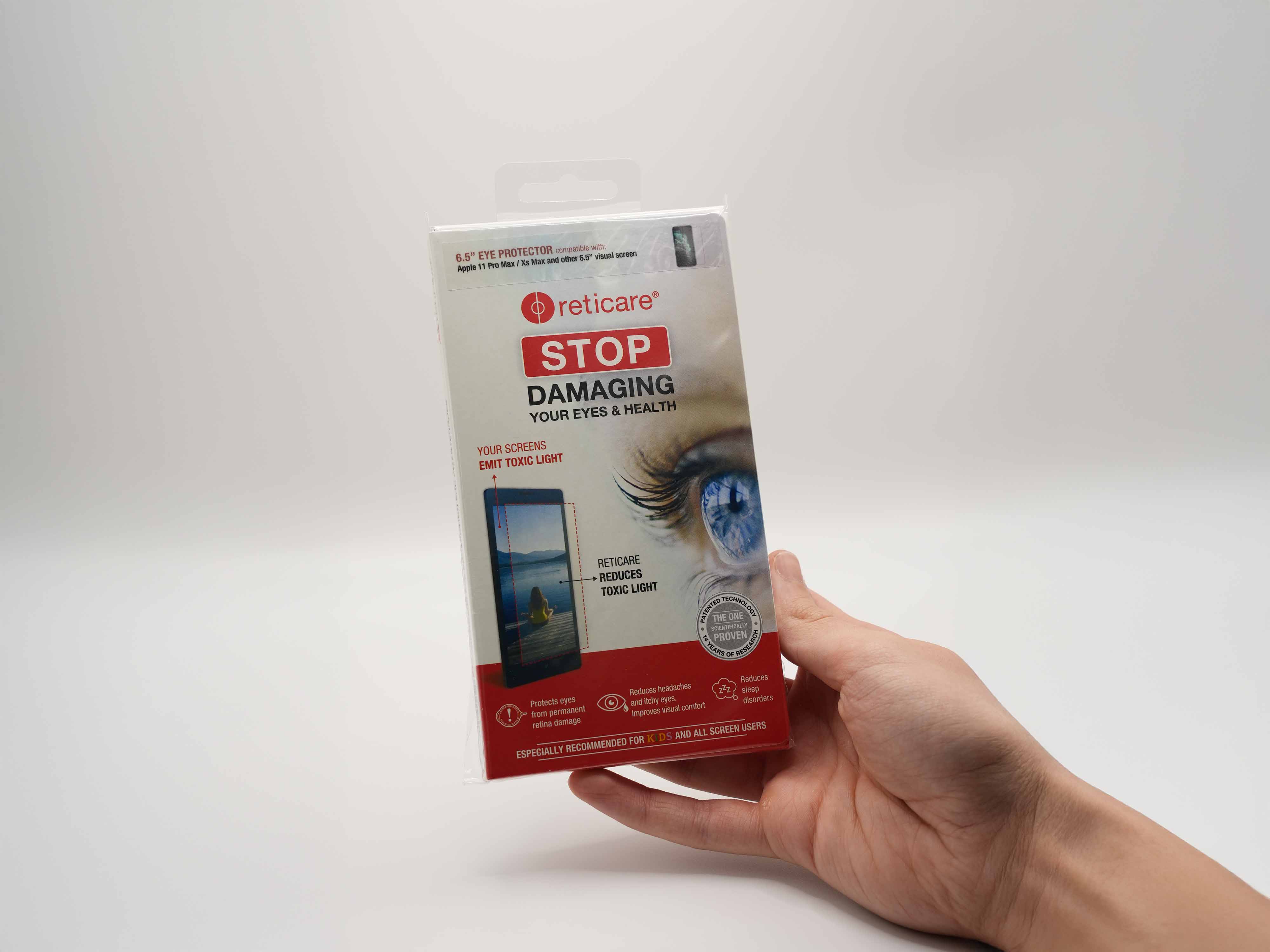 Stylish woman in a gray athletic outfit and headband standing confidently in a stadium, surrounded by empty blue seats and overhead steel beams.