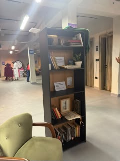 The shelf and the empty chair, Where Is Dadiyata?, Gatefield Office, Abuja. Photo: Aisha Aliyu-Bima.