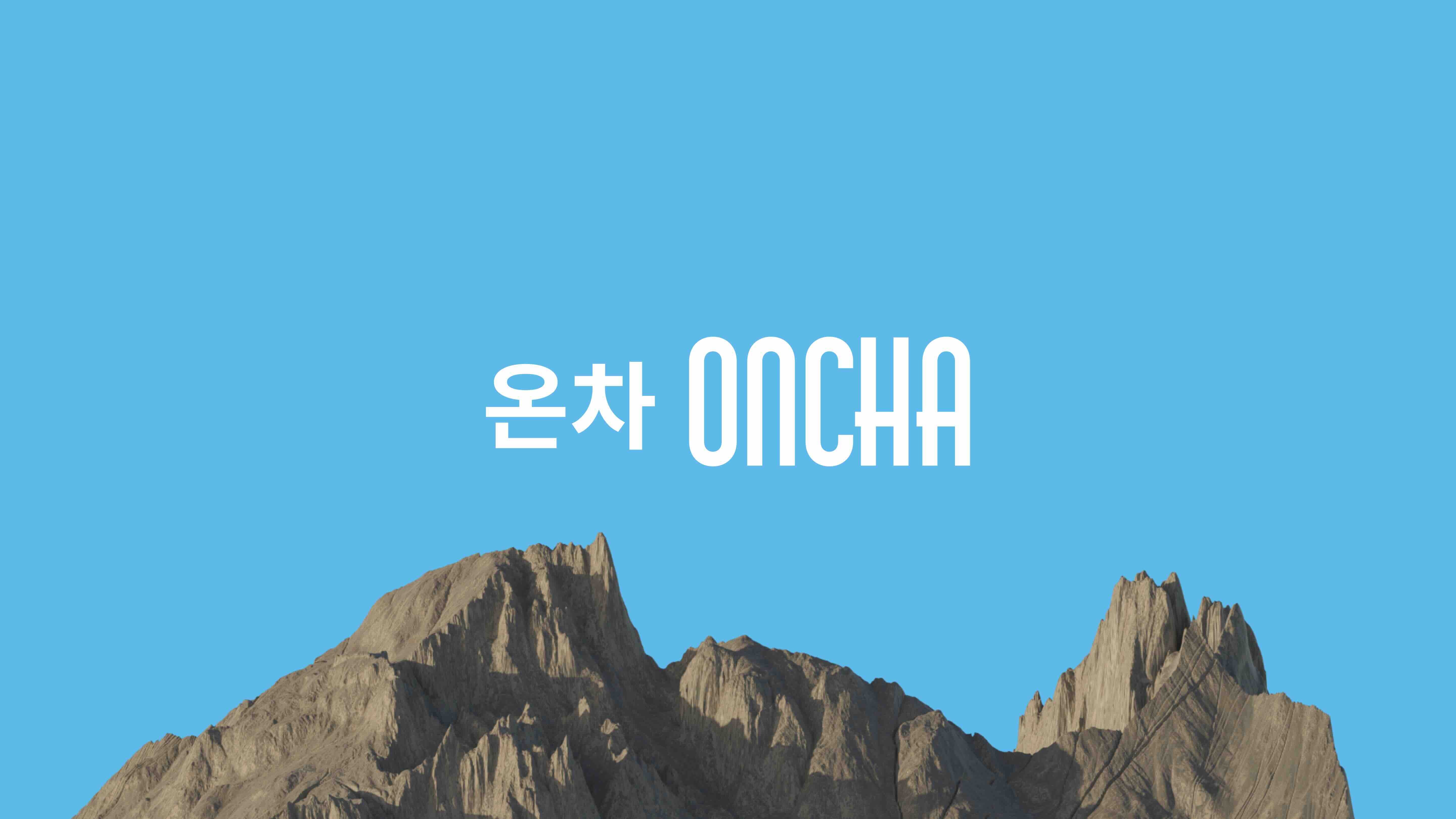 Athlete in a red tank top and black shorts sprinting outdoors, wearing white and red sports sunglasses under a clear blue sky.