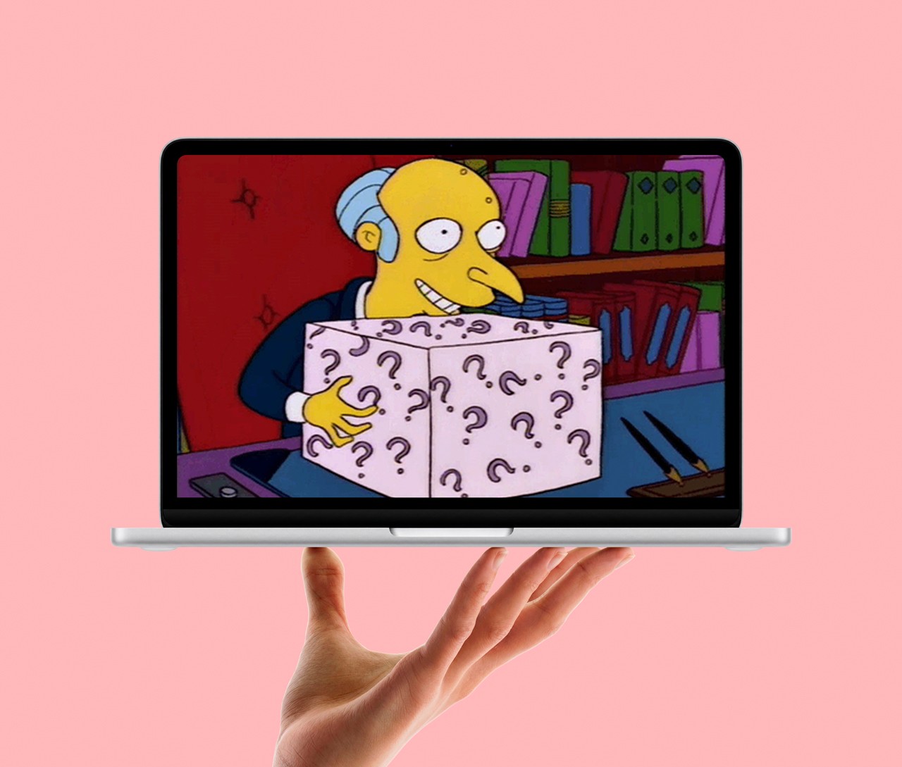 An image of mr burns from the simpsons holding the mystery box