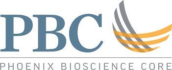 a black and white living room with a large tv