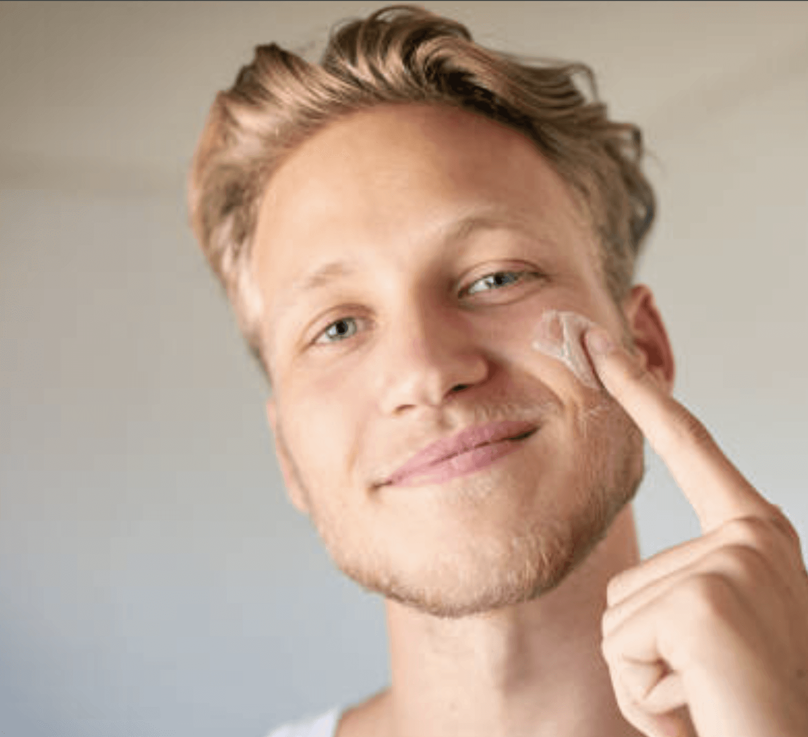 Beautiful lady with a ray of sunlight shining on her face