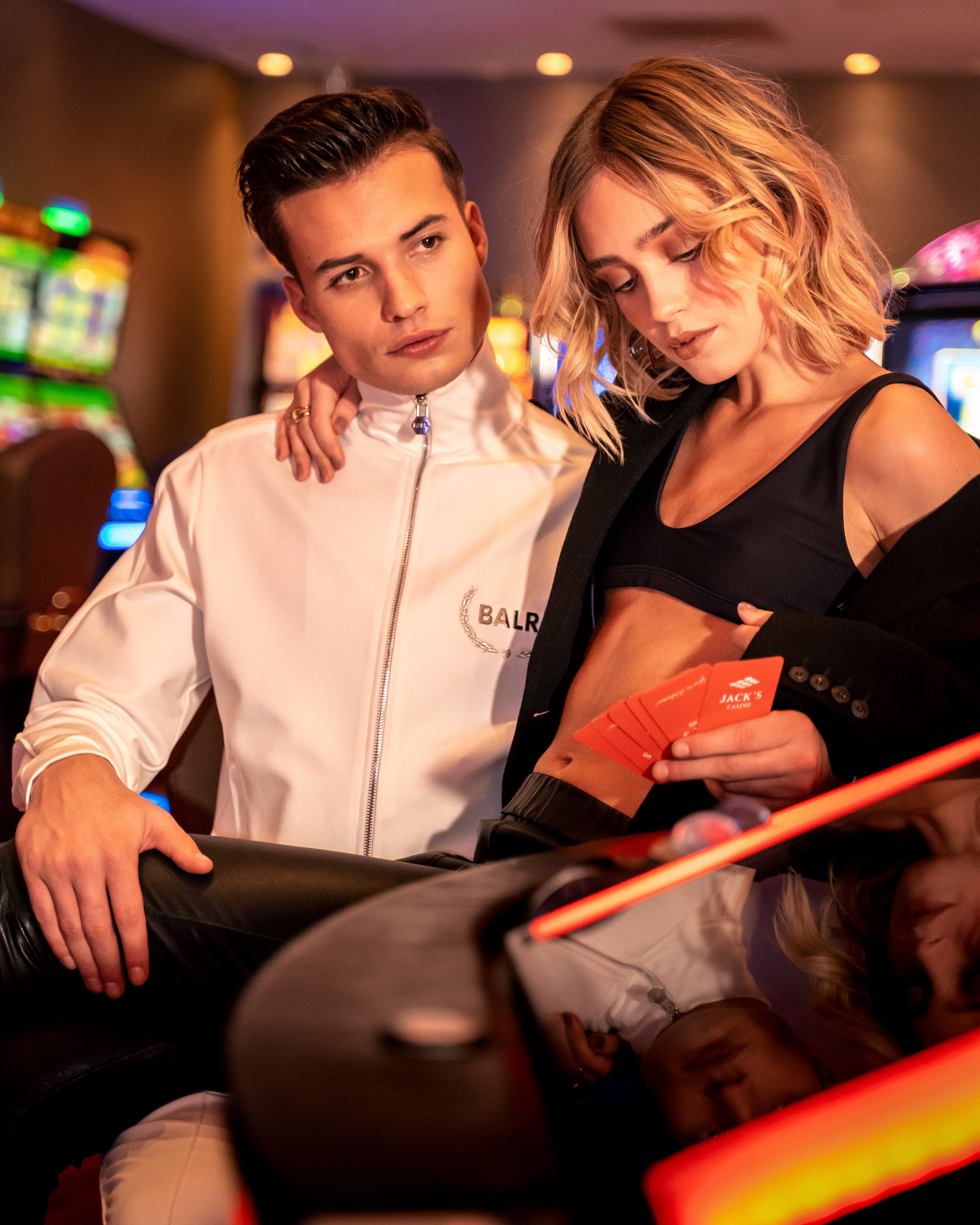 Streetside billboard with flyposters of the Batch.Works brand and illustrations