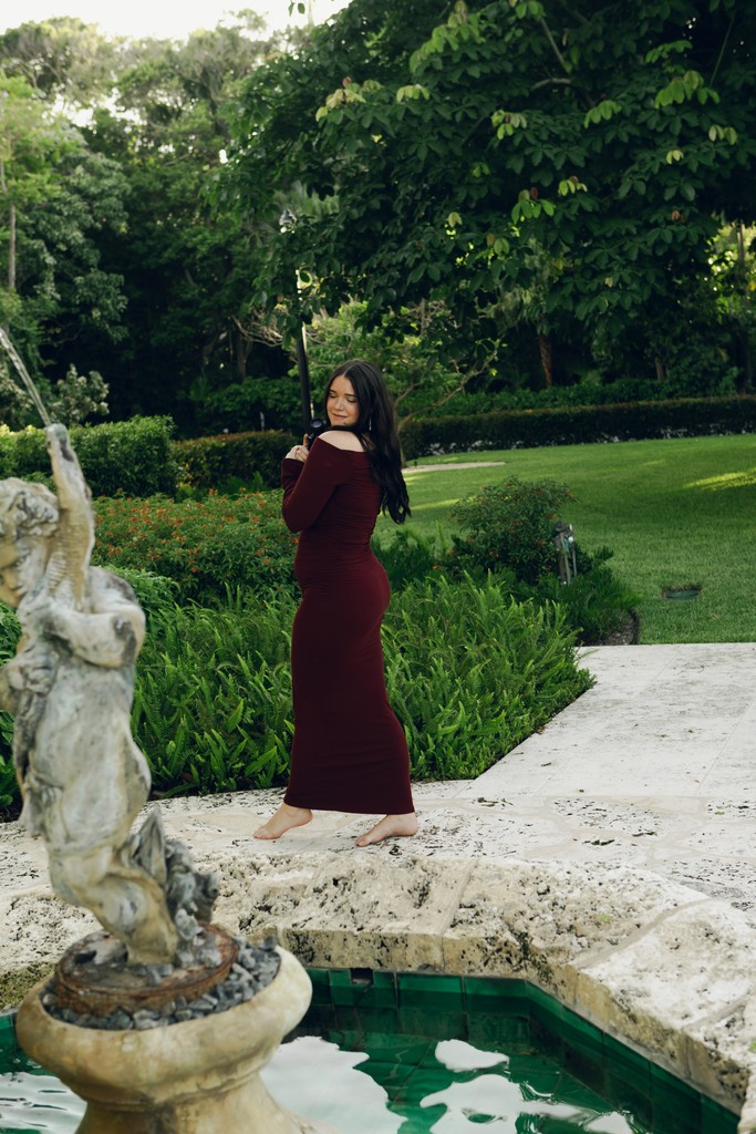     Palm Beach wedding photographer captures an editorial self portrait outdoors in natural light.