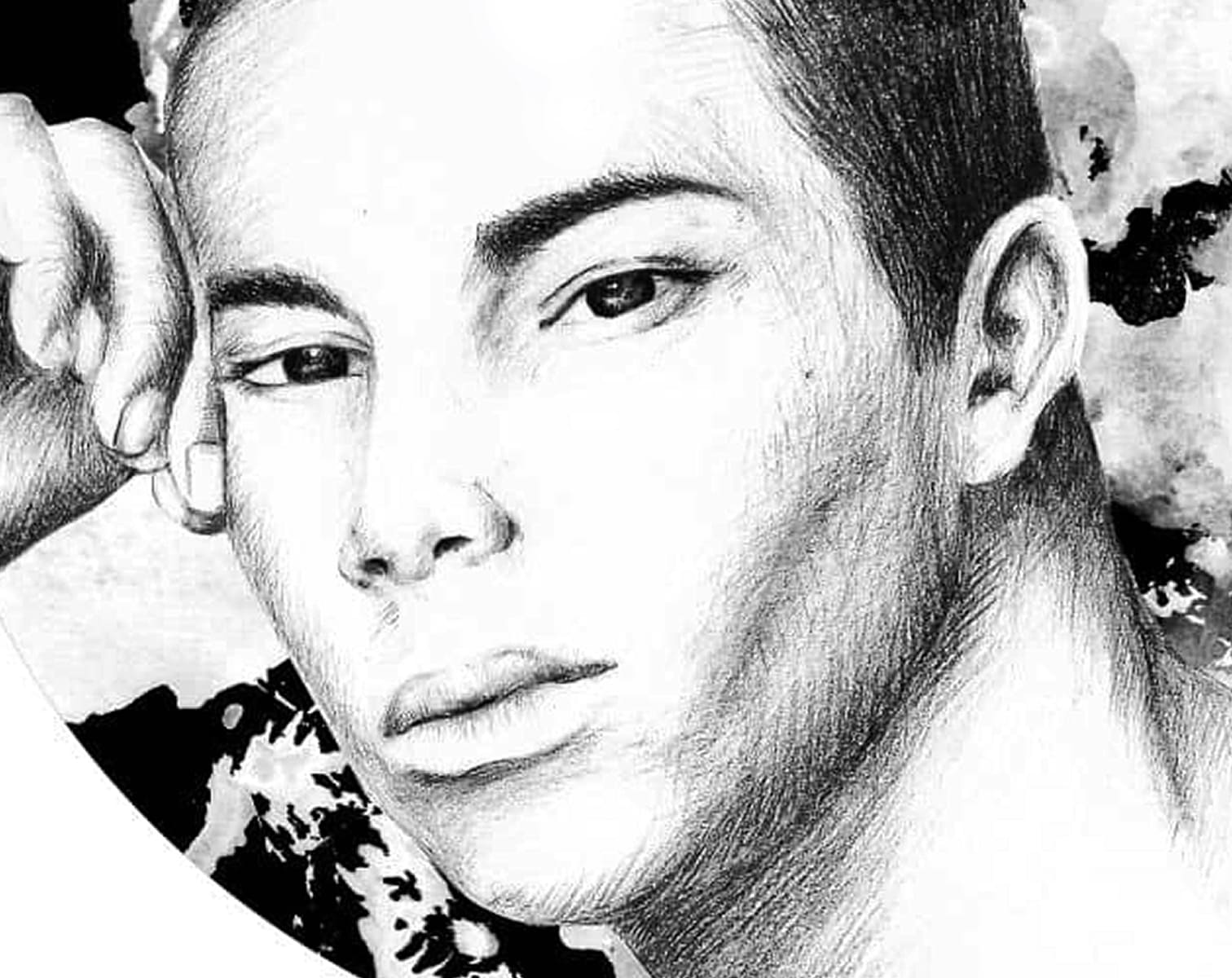 Graphite portrait of a man capturing facial expression, light, and subtle texture through detailed pencil strokes.