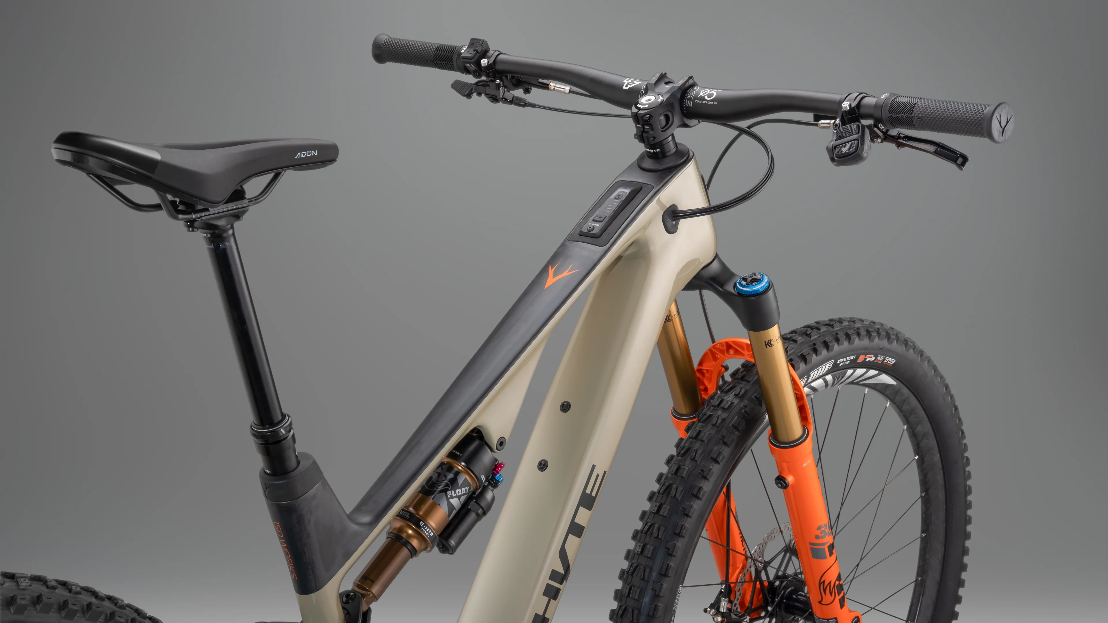Studio photograph of a Whyte Elyte electric mountain bike, highlighting the frame industrial design