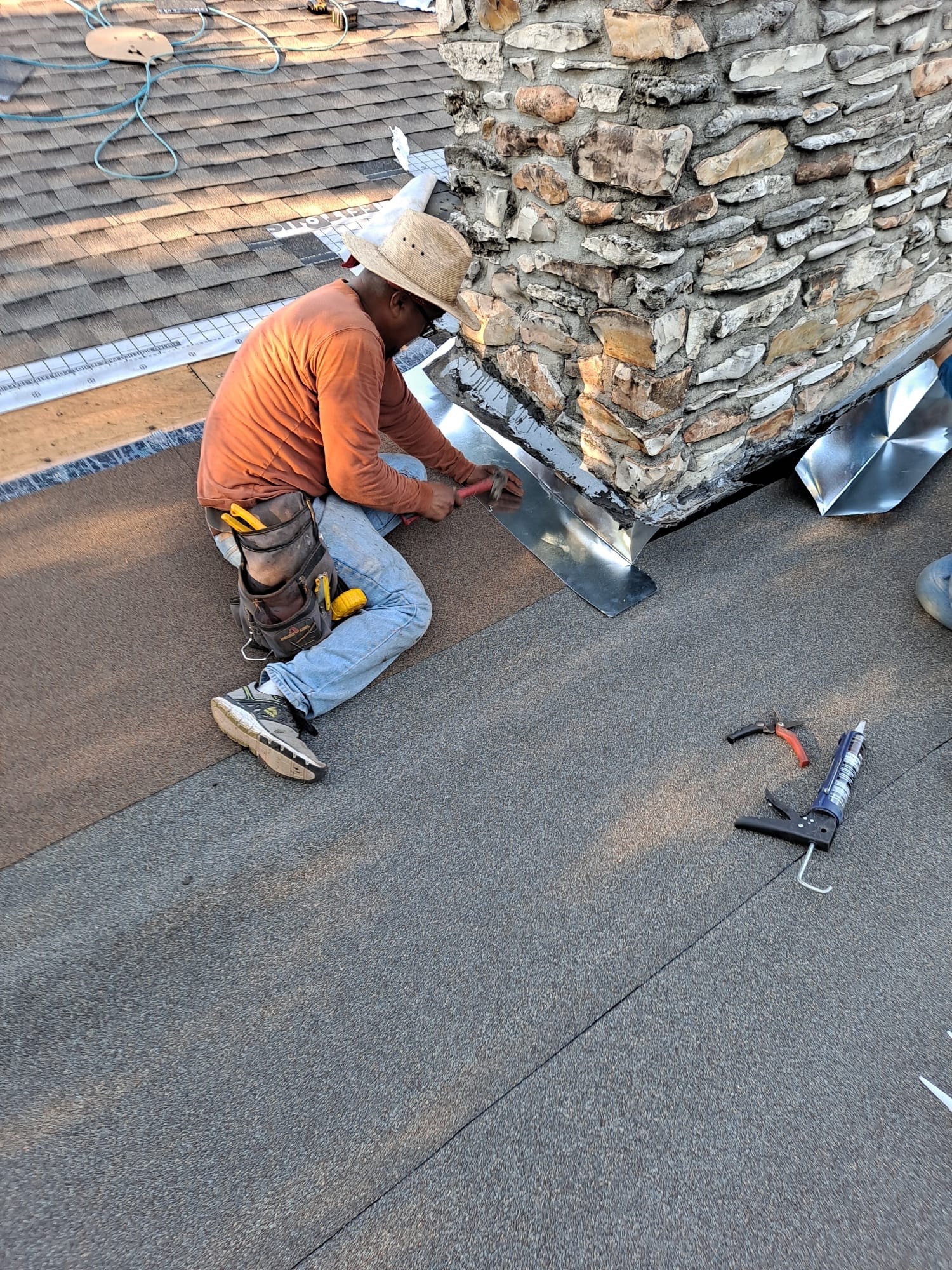 Chimeny repair on a flat modified bitumen section of a roof in austin texas. 