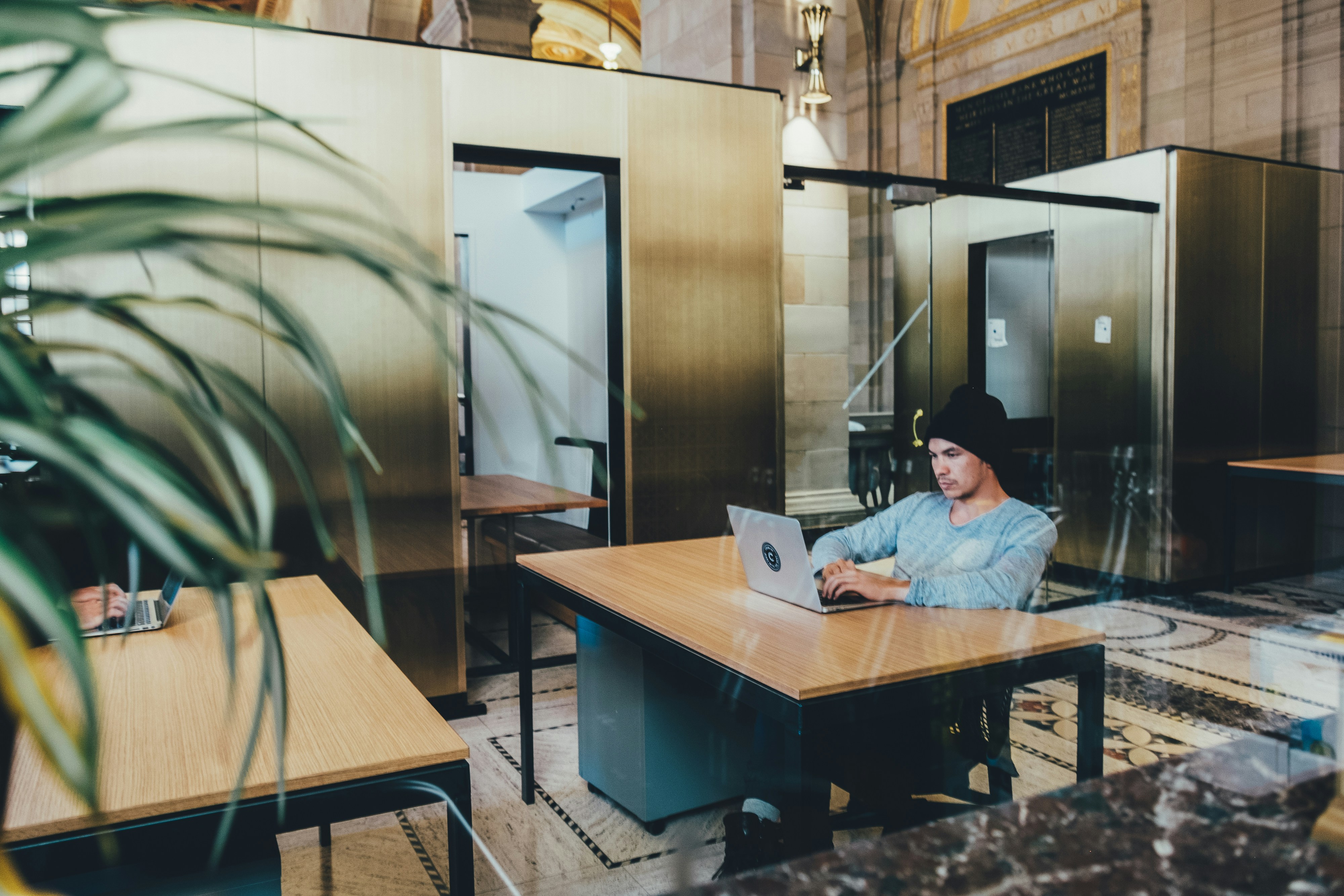 man working on a laptop - AI Photoshoot