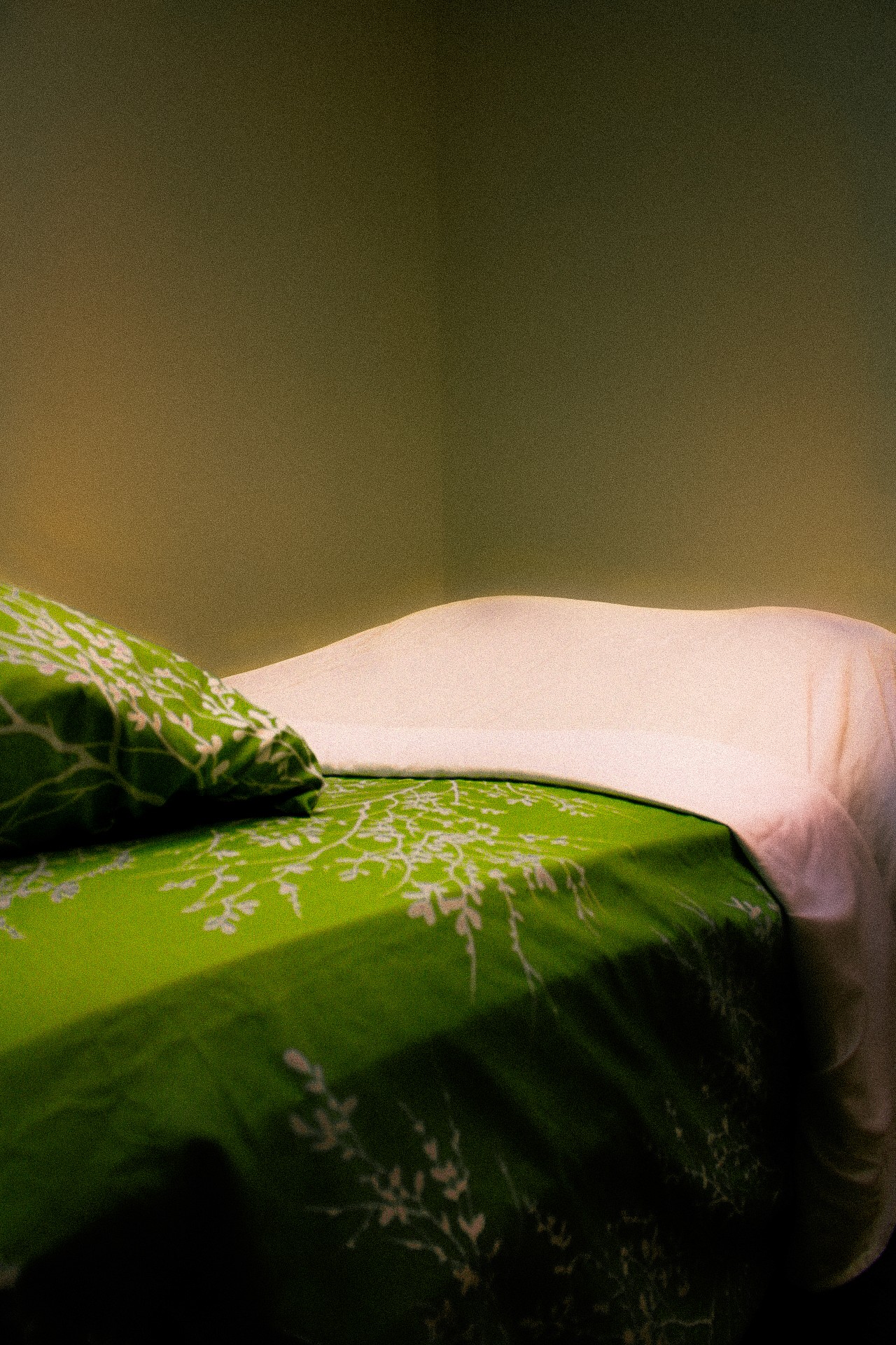 A treatment table with recently placed sheets 