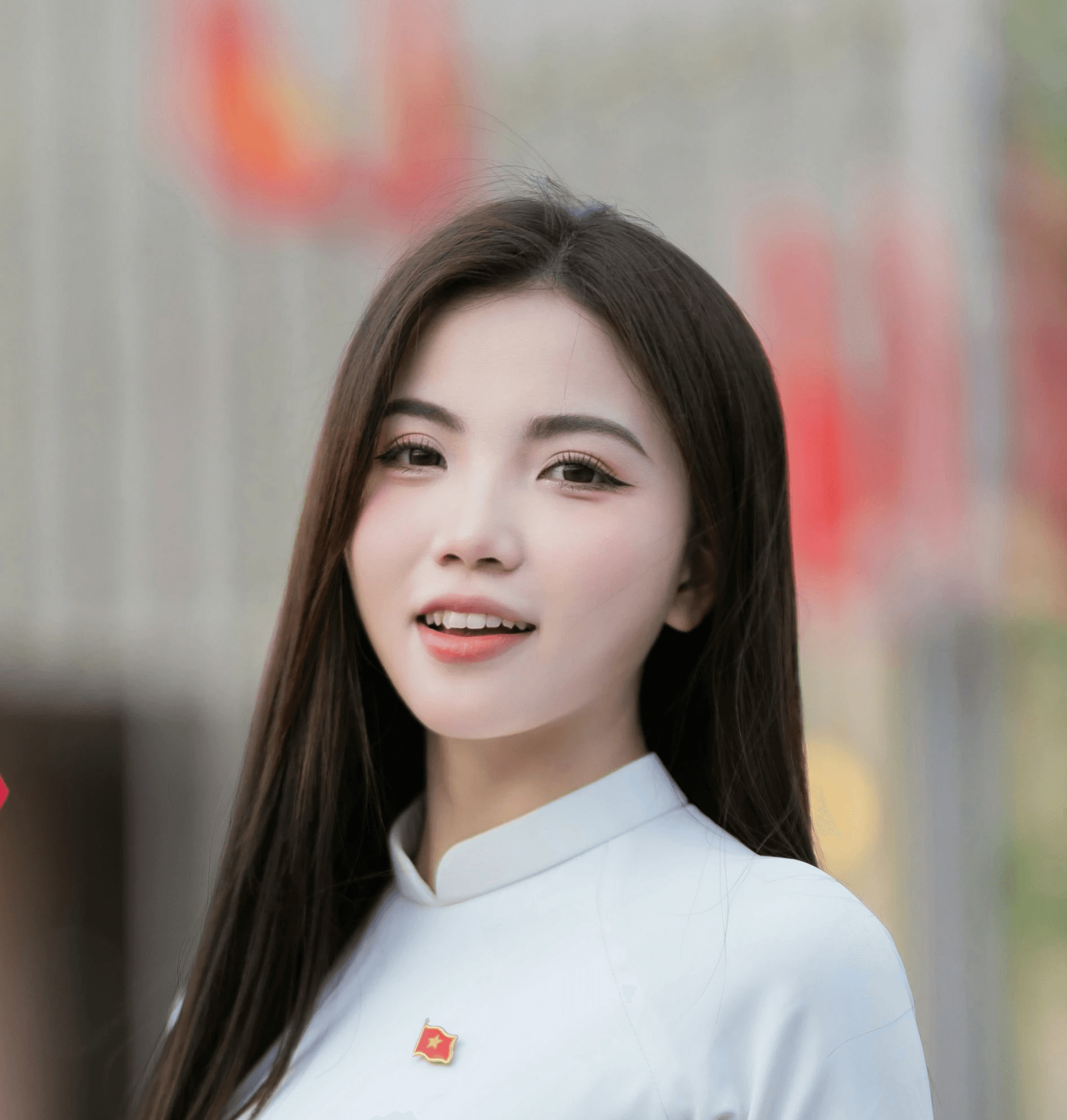 A woman with a vietnamese flag.