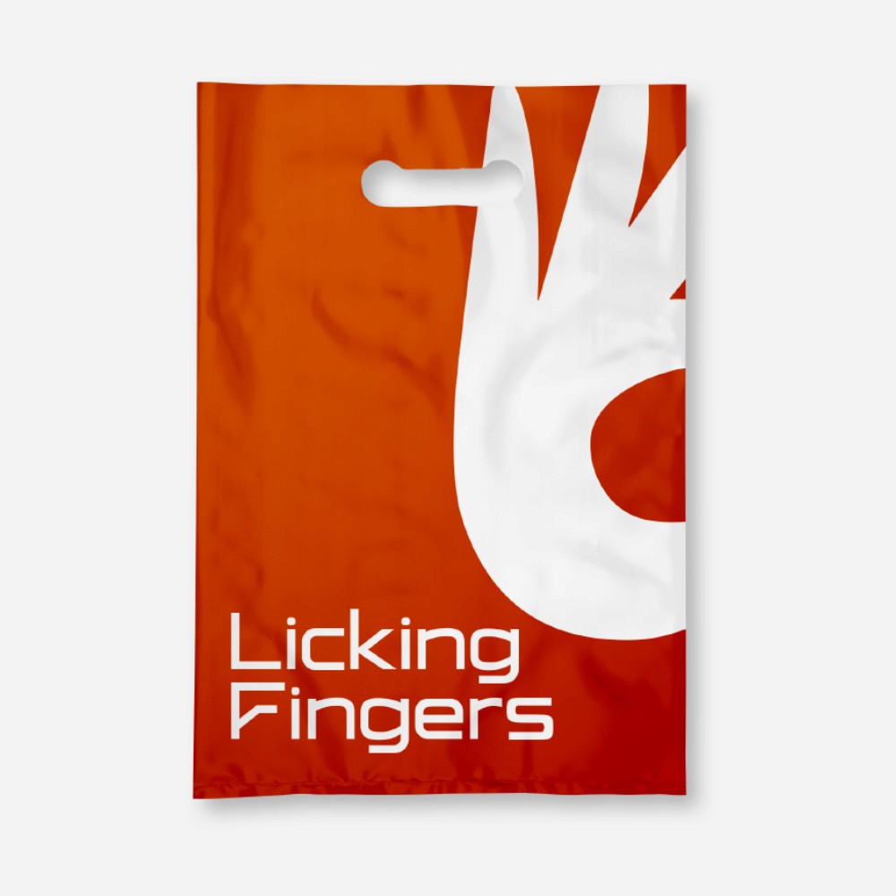 Bold, colorful food brand packaging for Licking Fingers restaurant