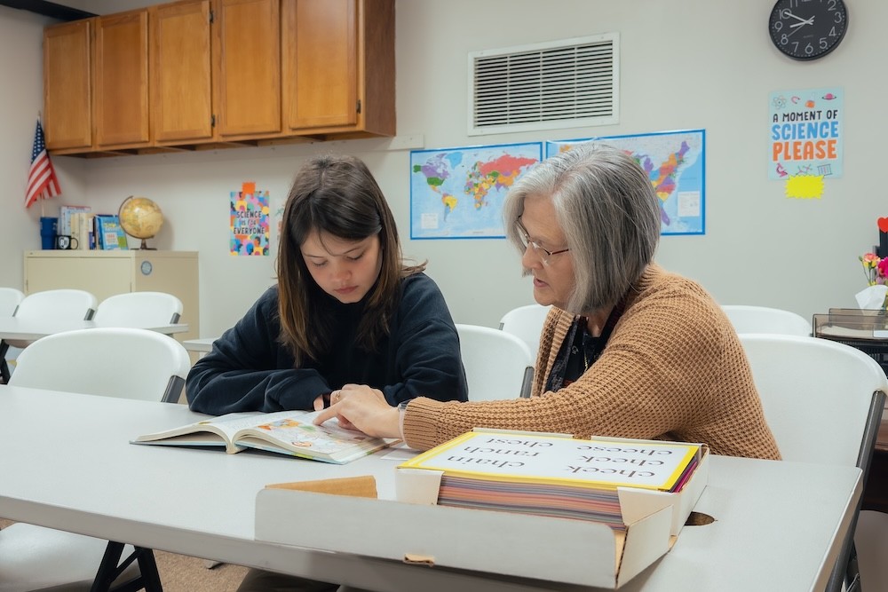 Mrs. Kiel tutoring a student