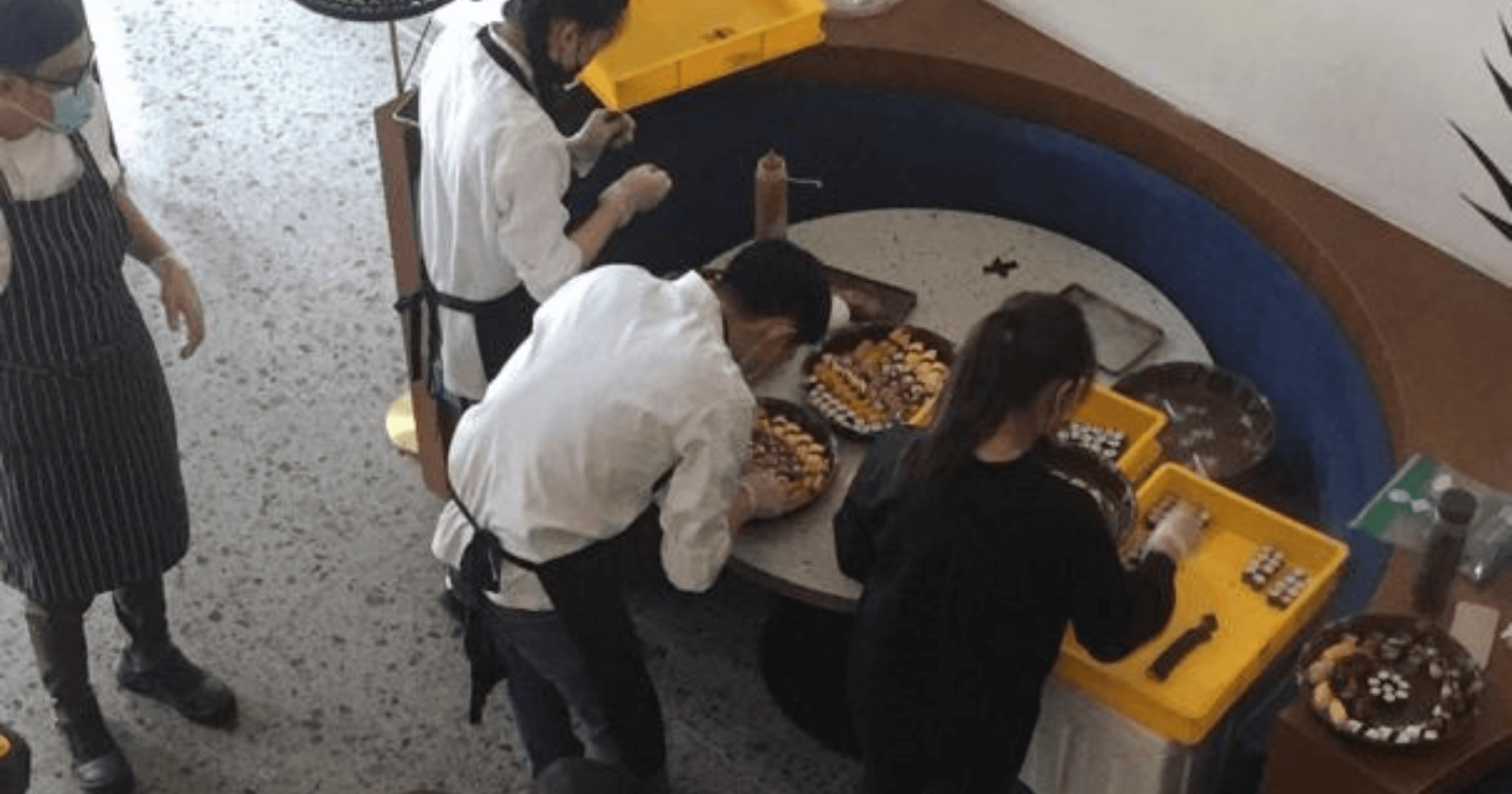 Kyudon staff packing orders in the dining room during the MCO period.