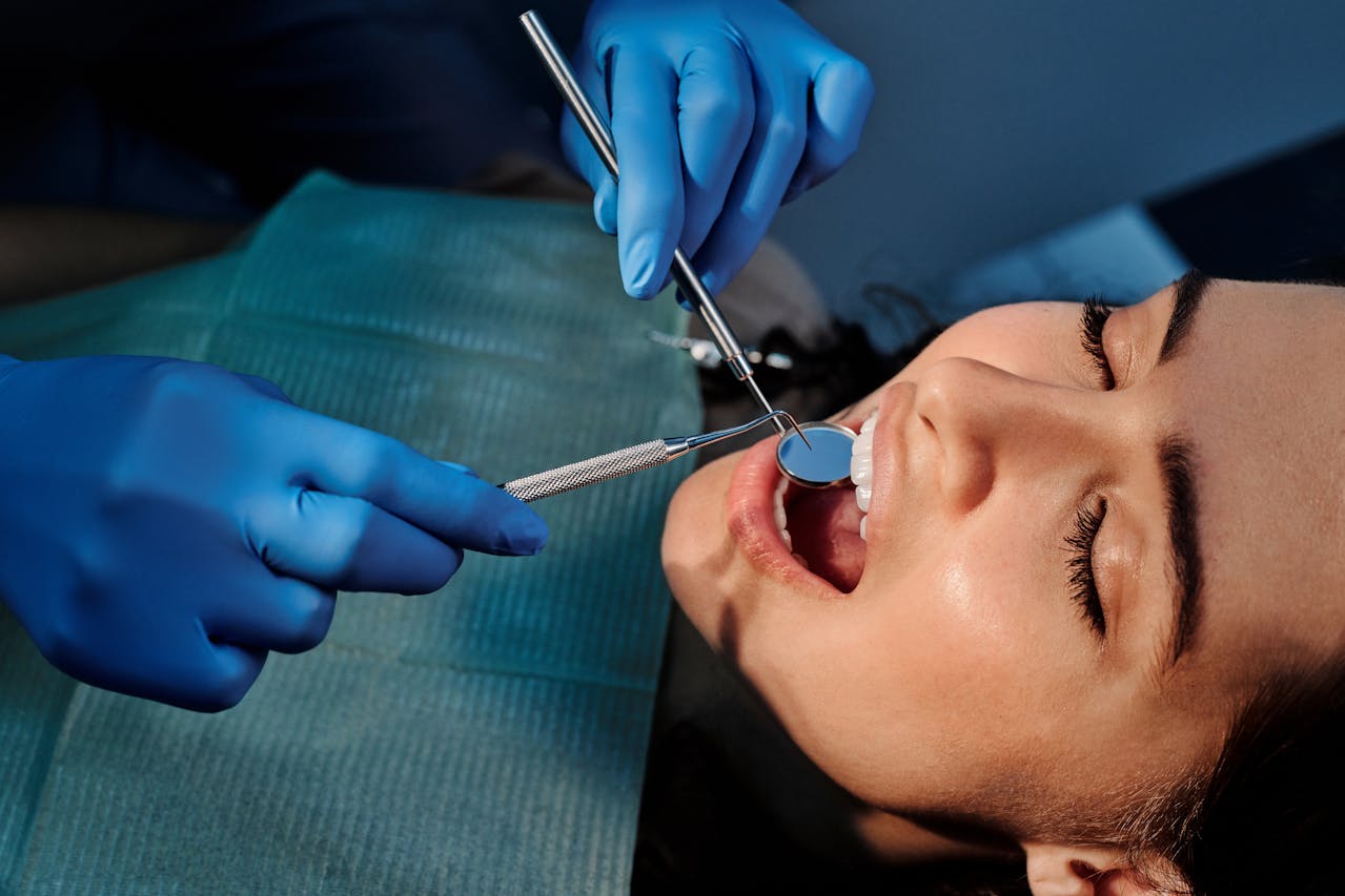 A dentist following standard operting procedures