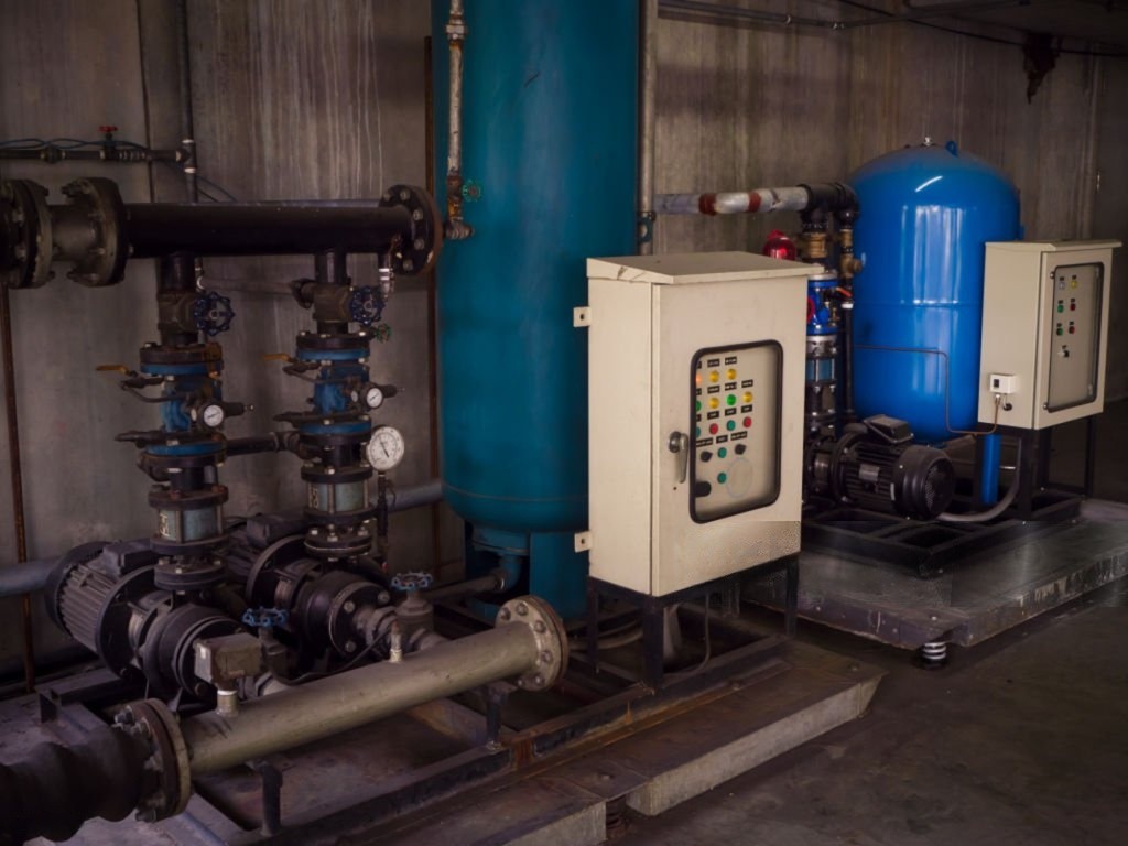 Industrial pump system with blue valves.
