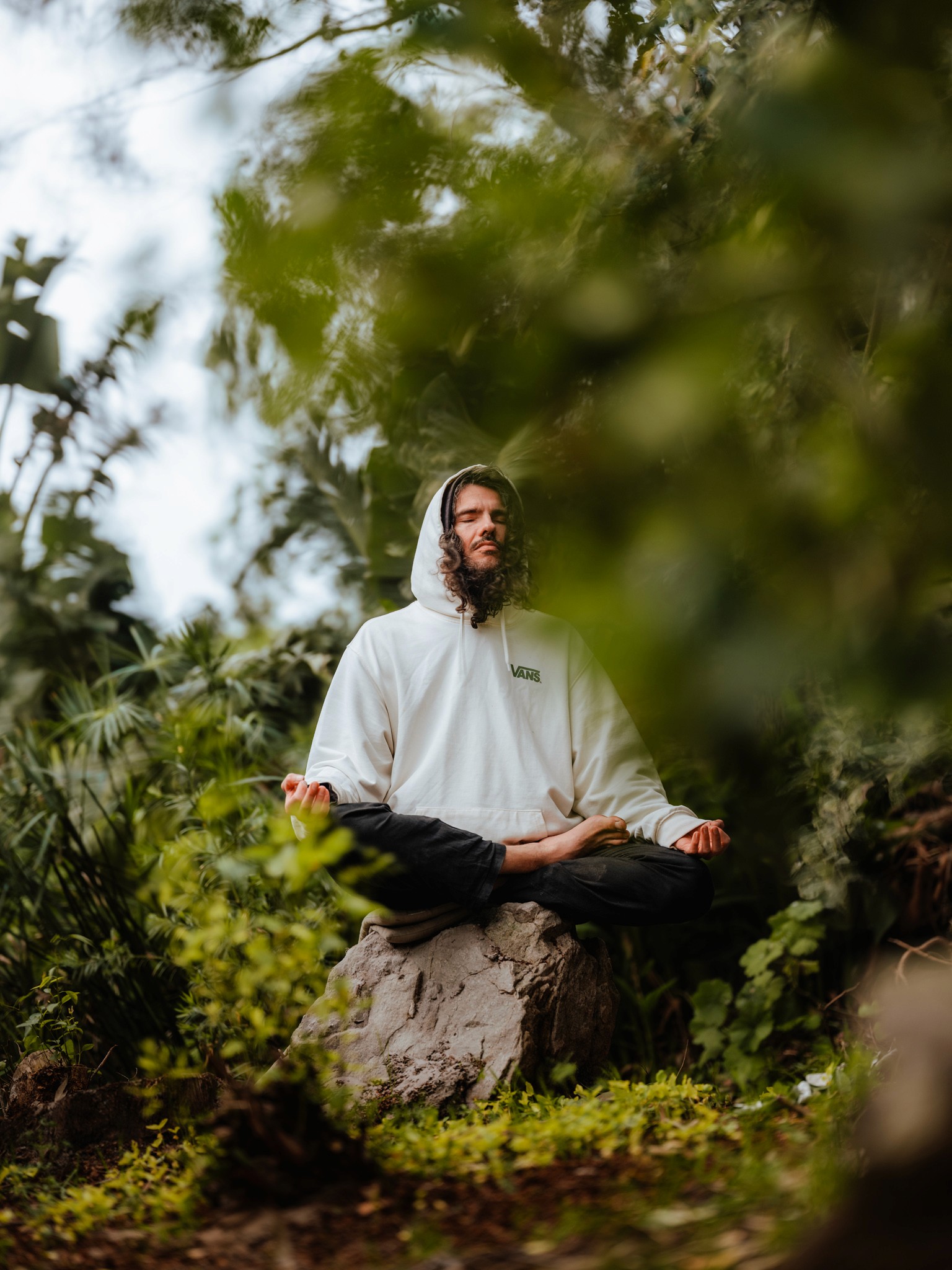 man meditating in nature