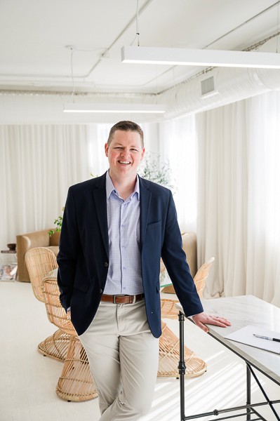 Wedding portrait of bride in groom in cathedral hallway downtown Nashville, Tennessee.