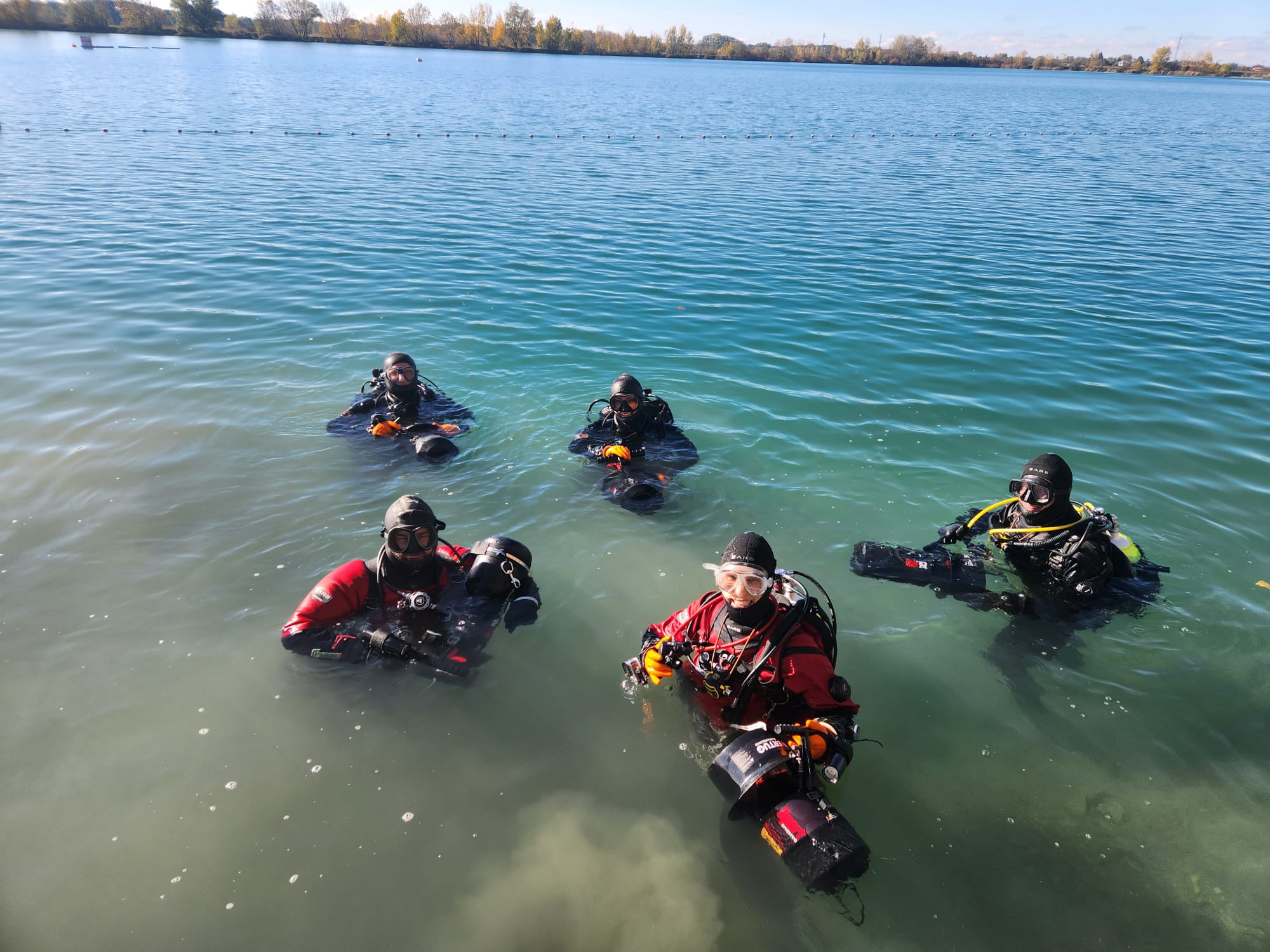 photography of two persons underwater