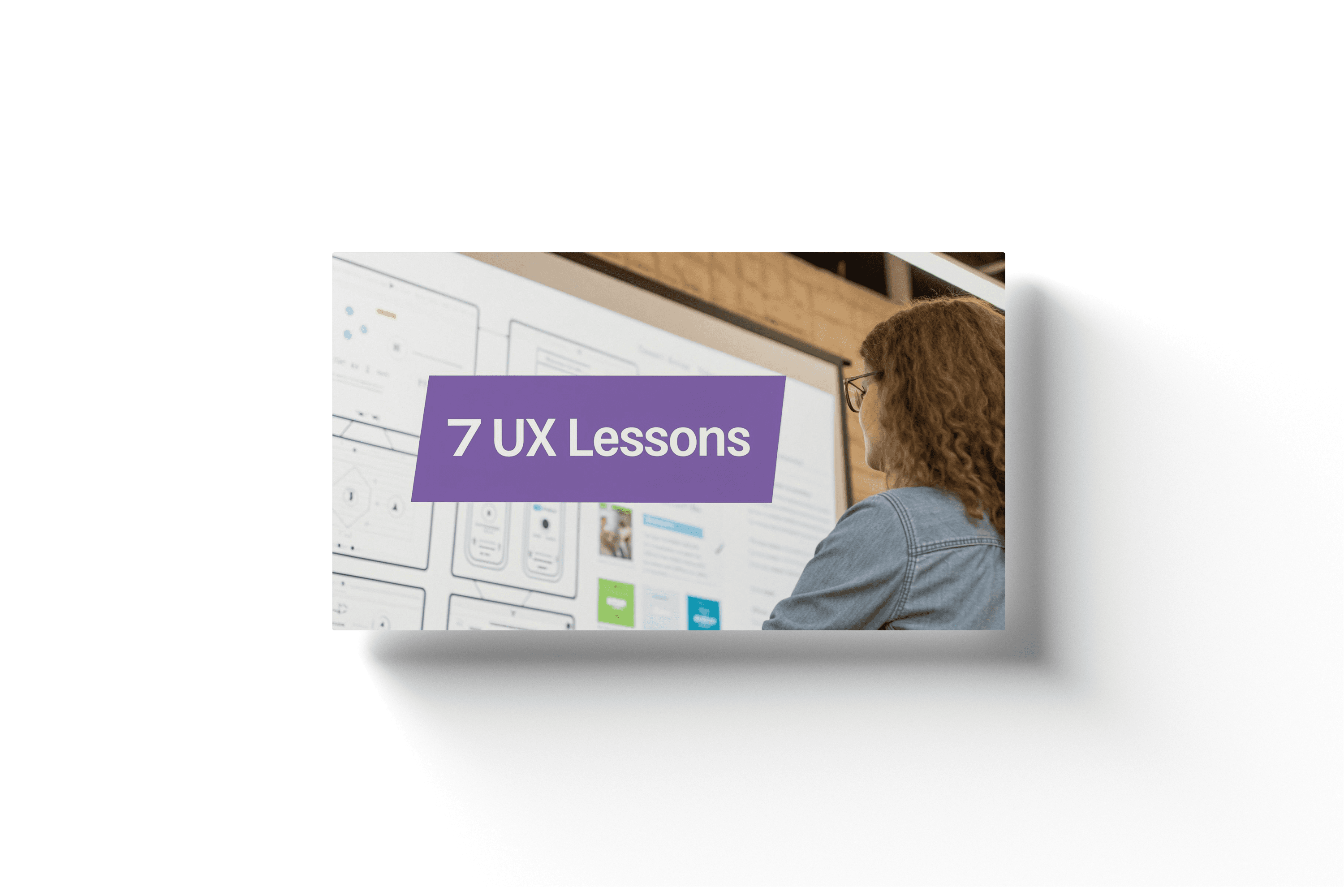 a woman studying a smartboard and the text '7 ux lessons'