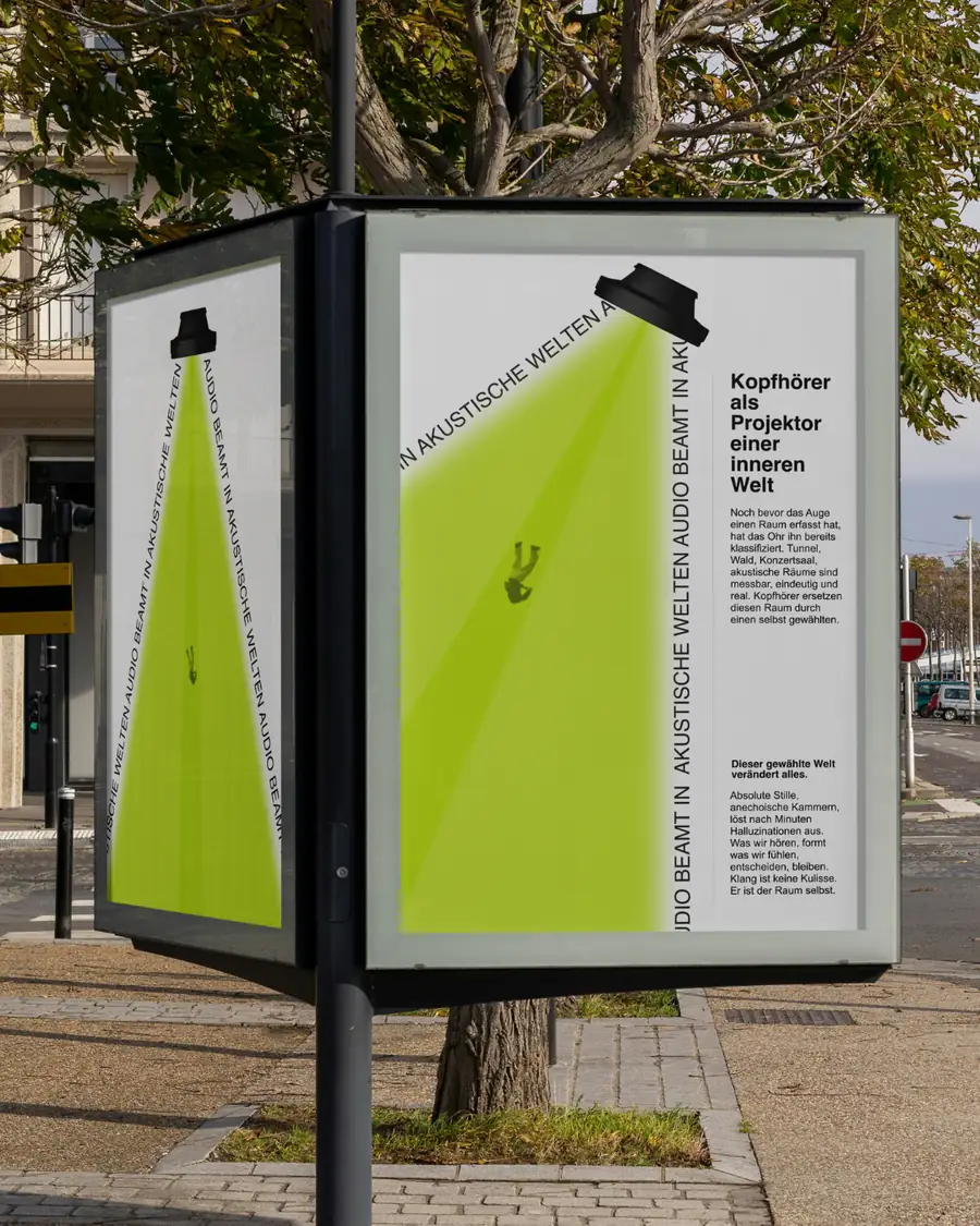 Akustische Welten, the poster in a city-light frame on the street.