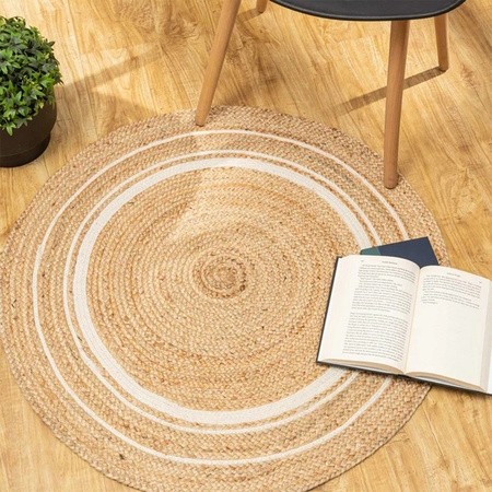 Handwoven natural jute round rug with white concentric border
